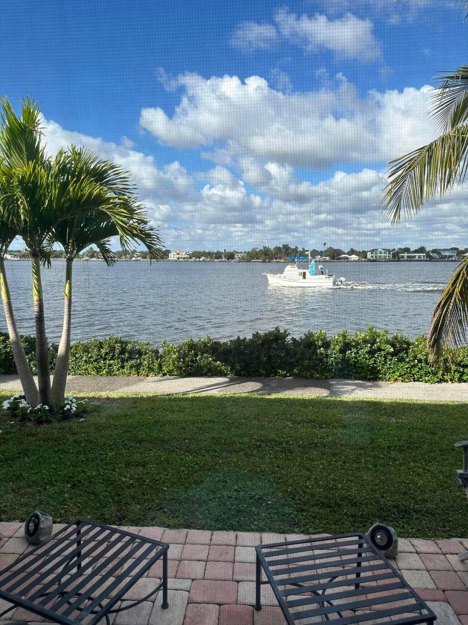 Enjoy extraordinary sunsets from this west facing Direct Intracoastal turnkey !