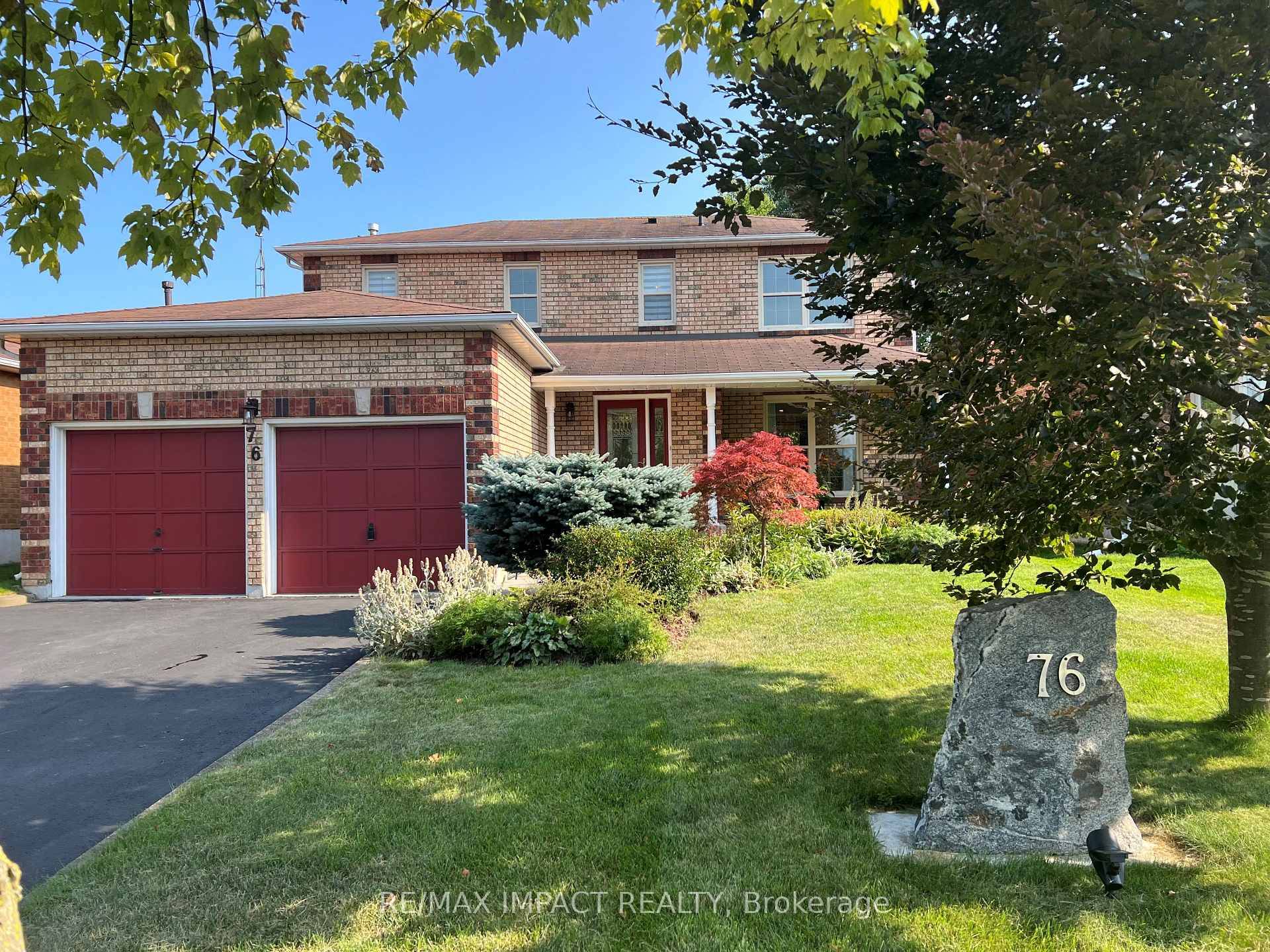 This charming 3 bedroom family home at 76 Foster Creek Drive offers exceptional curb appeal and a welcoming front porch sitting area.