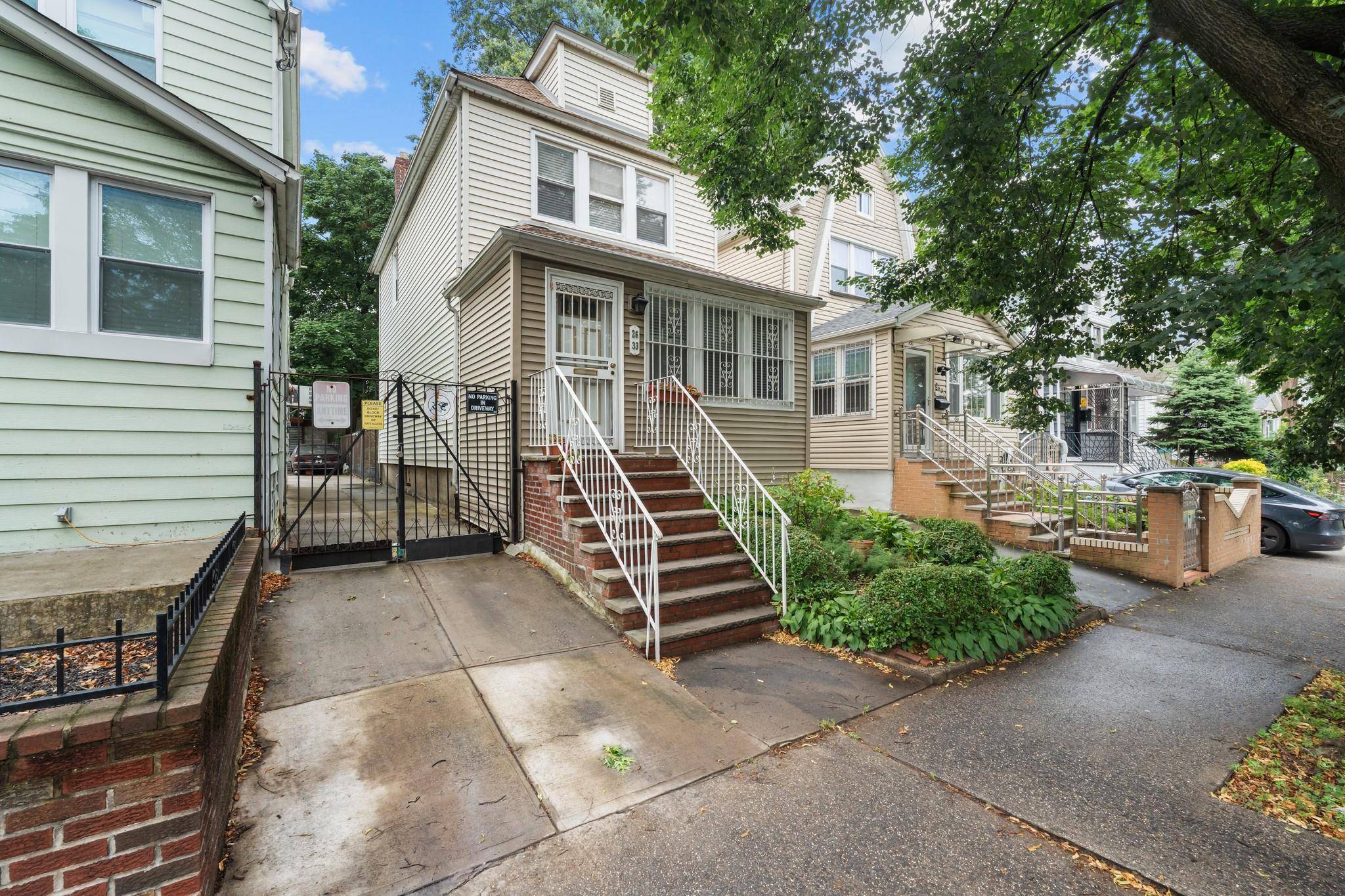 Welcome to 26 33 94th Street, a fully detached single family home in East Elmhurst featuring three bedrooms, one and a half baths, a private driveway, and a fully enclosed ...