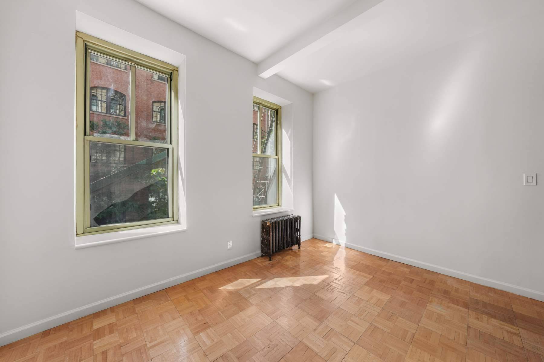 Arrive to this gracious second floor one bedroom, tucked along a quiet, tree lined street in the heart of Noho.