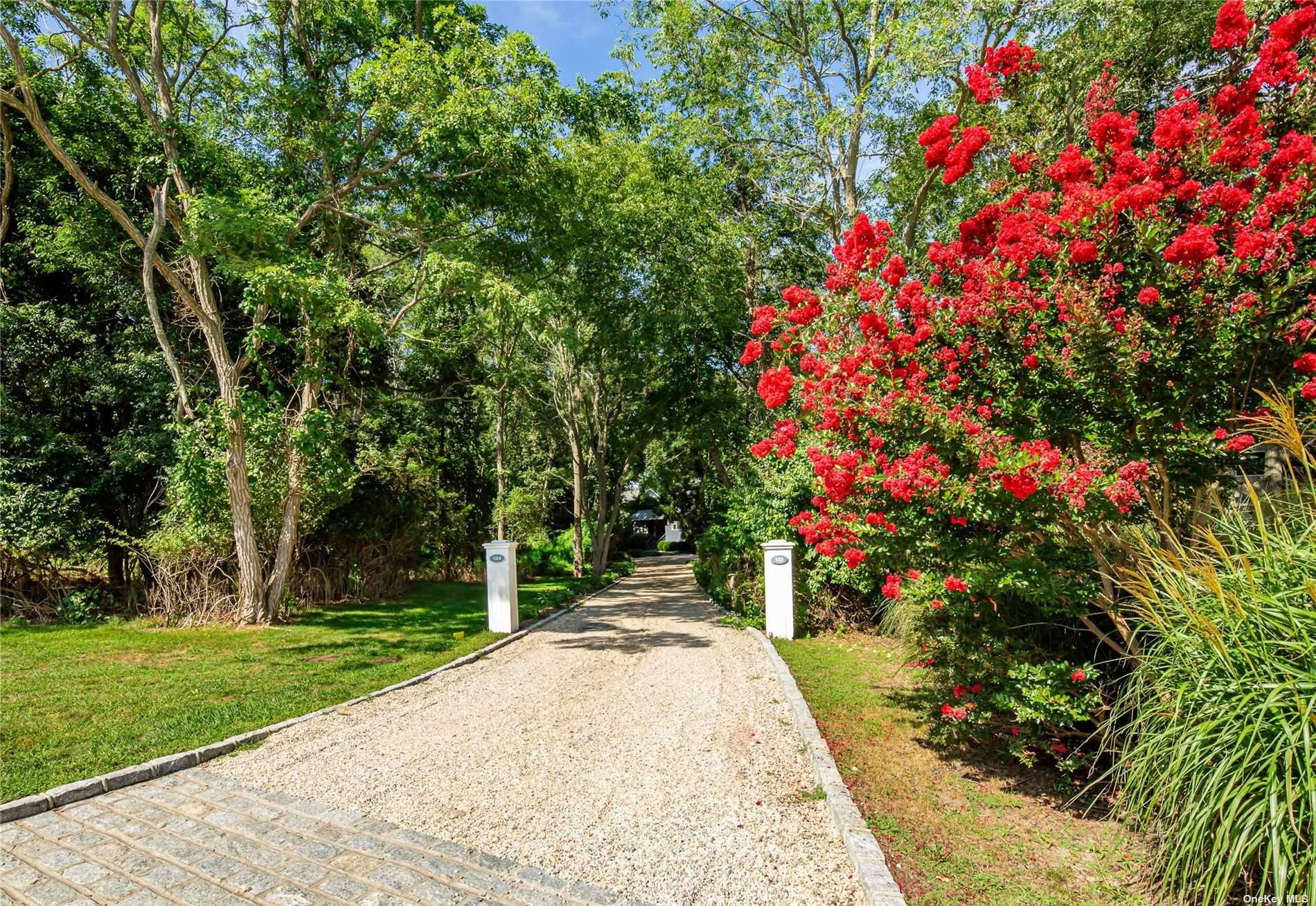 Marketing Text Bridgehampton Summer Rental This bright and spacious home, nestled down a private driveway and adjacent to a scenic reserve, is a hidden gem off Lumber Lane in Bridgehampton.