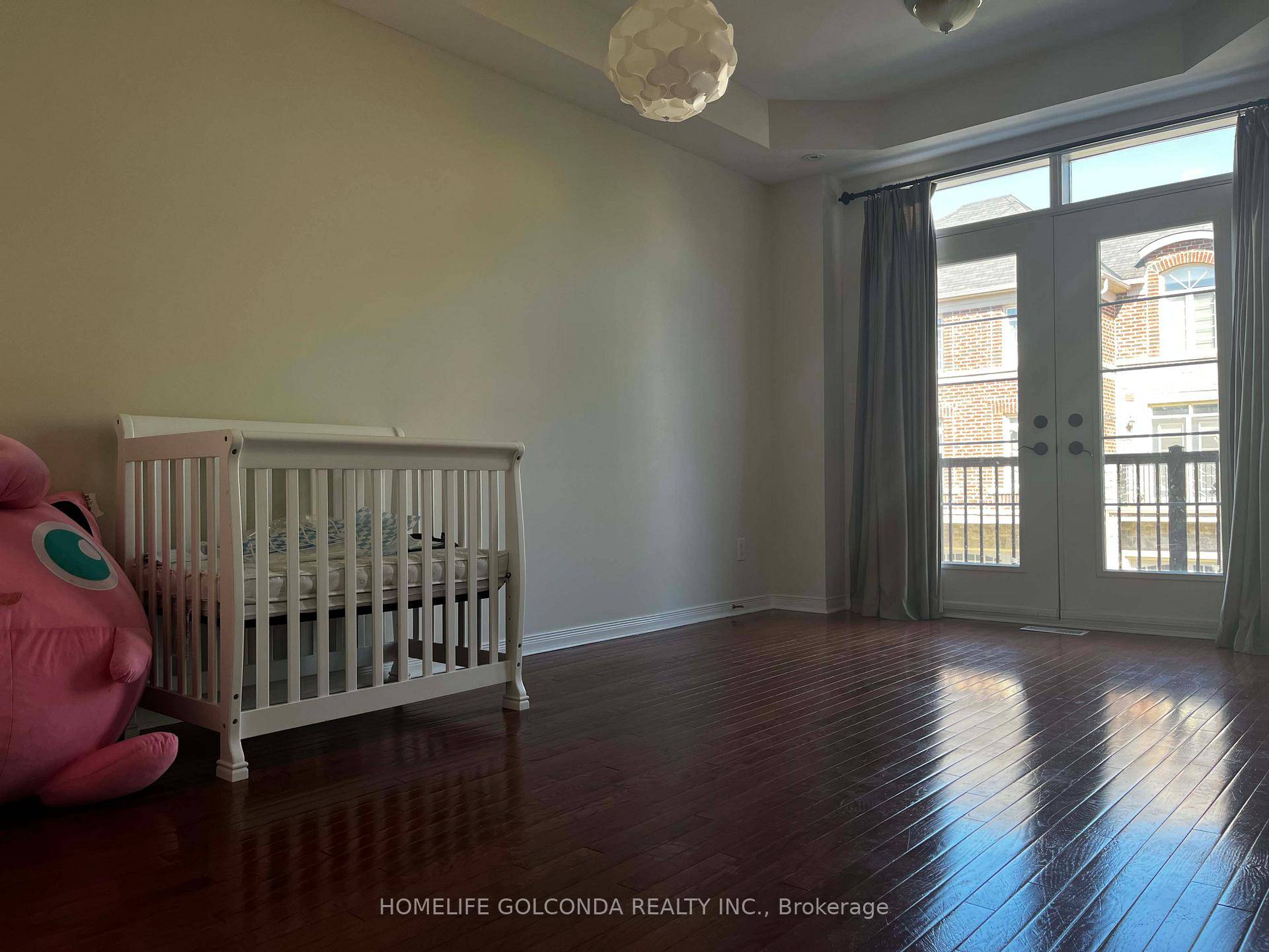 All level hardwood floor, open concept kitchen and family room.