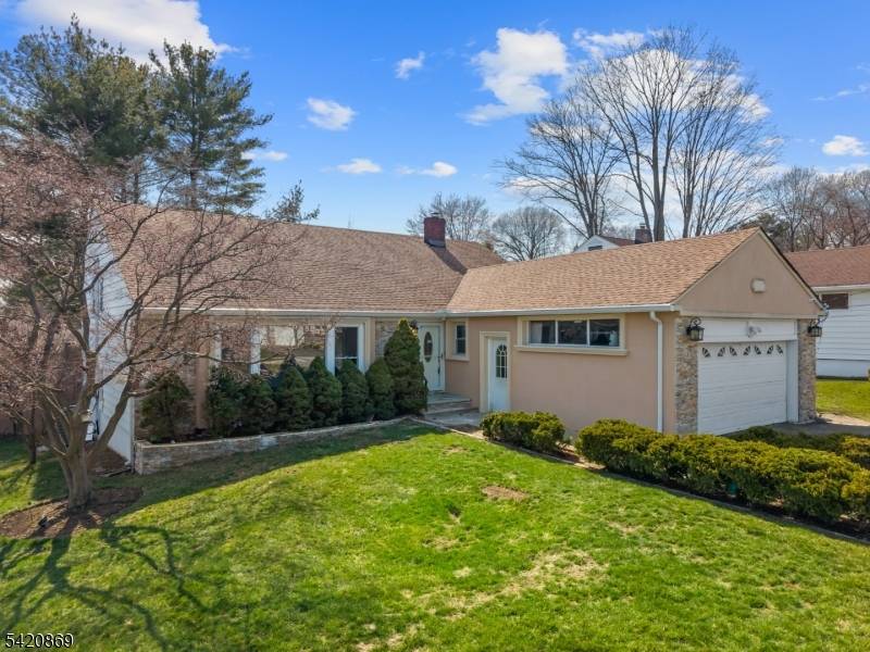 Welcome to this beautifully expanded split level home nestled in the highly sought after Montclair Heights section of Clifton !