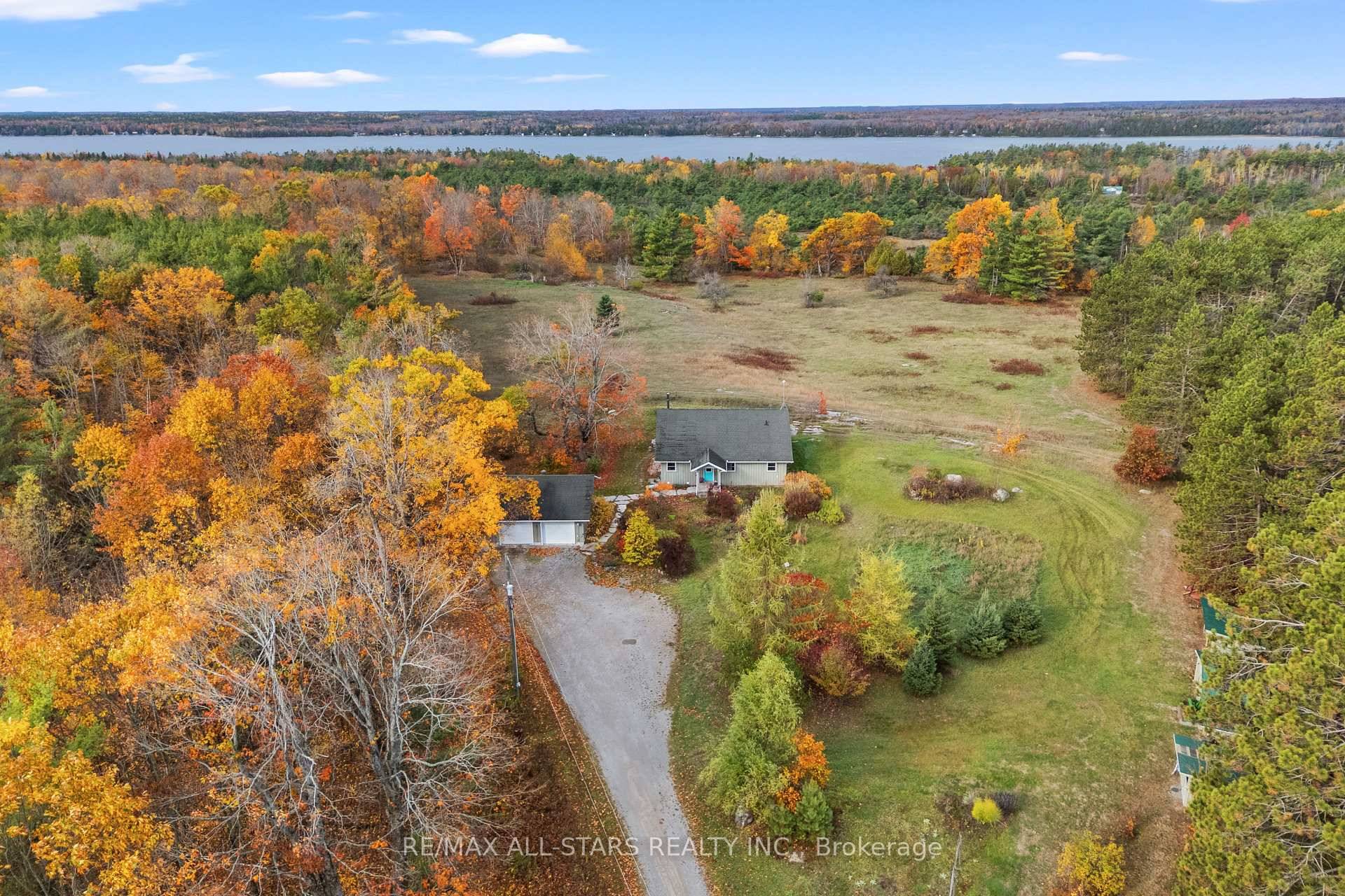 Discover this beautifully maintained bungalow, built in 2009, perfectly situated on a private 6.