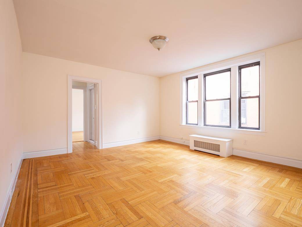 Large bright one bedroom in prewar elevator building on great Village block.
