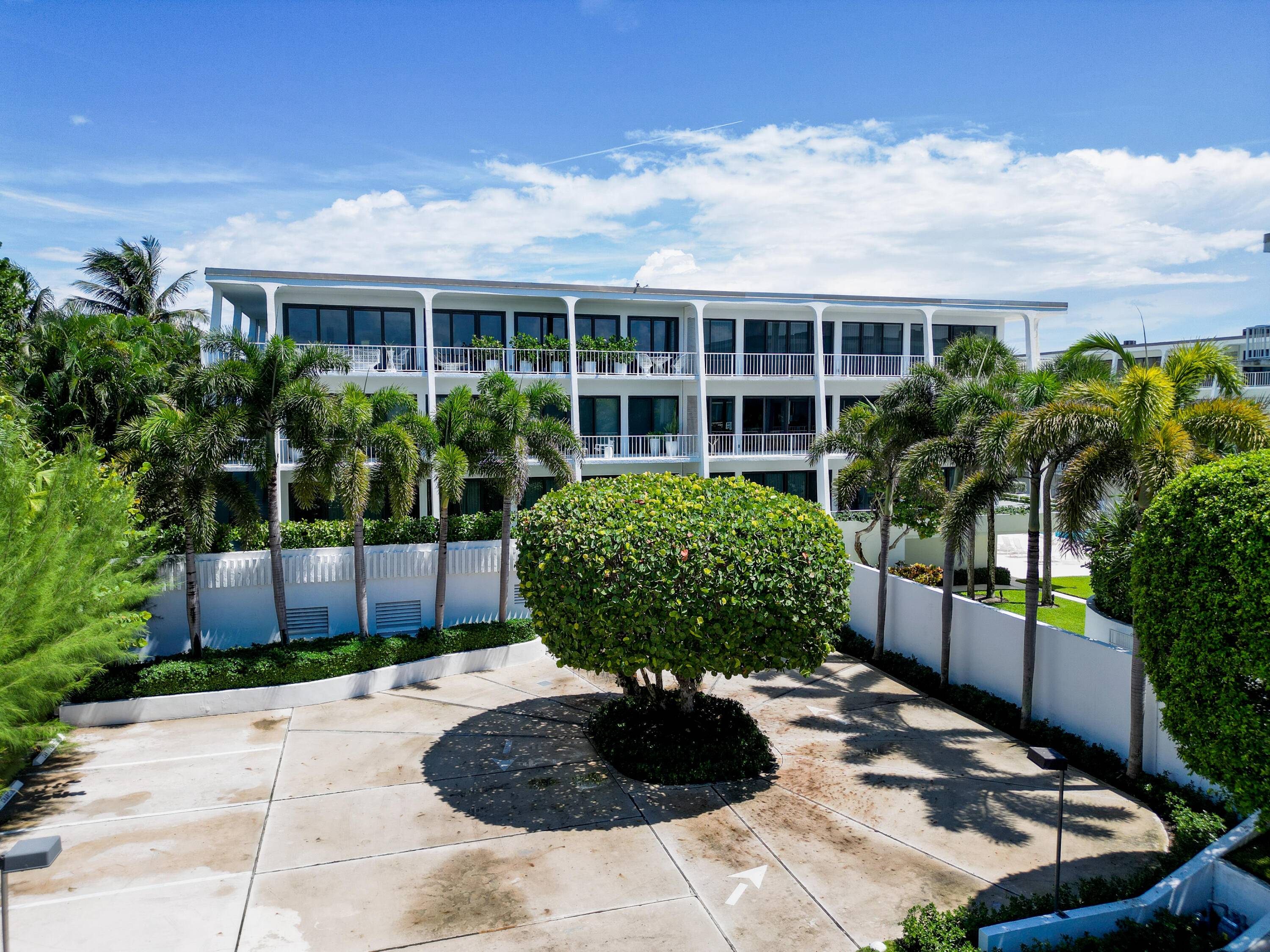 An exquisitely designed and recently published, 2 bedroom, 2 bathroom condo with an expansive terrace with water views, in one of the most desired buildings in Palm Beach.