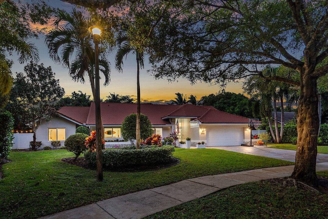 Absolute perfection ! Stunning completely renovated, like new home with a pool on over 1 3 acre in Delray Beach.