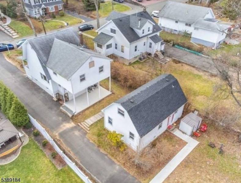 Don't miss out on this unique legal 2 family front and back property, situated on a spacious 60 x 205 foot lot.