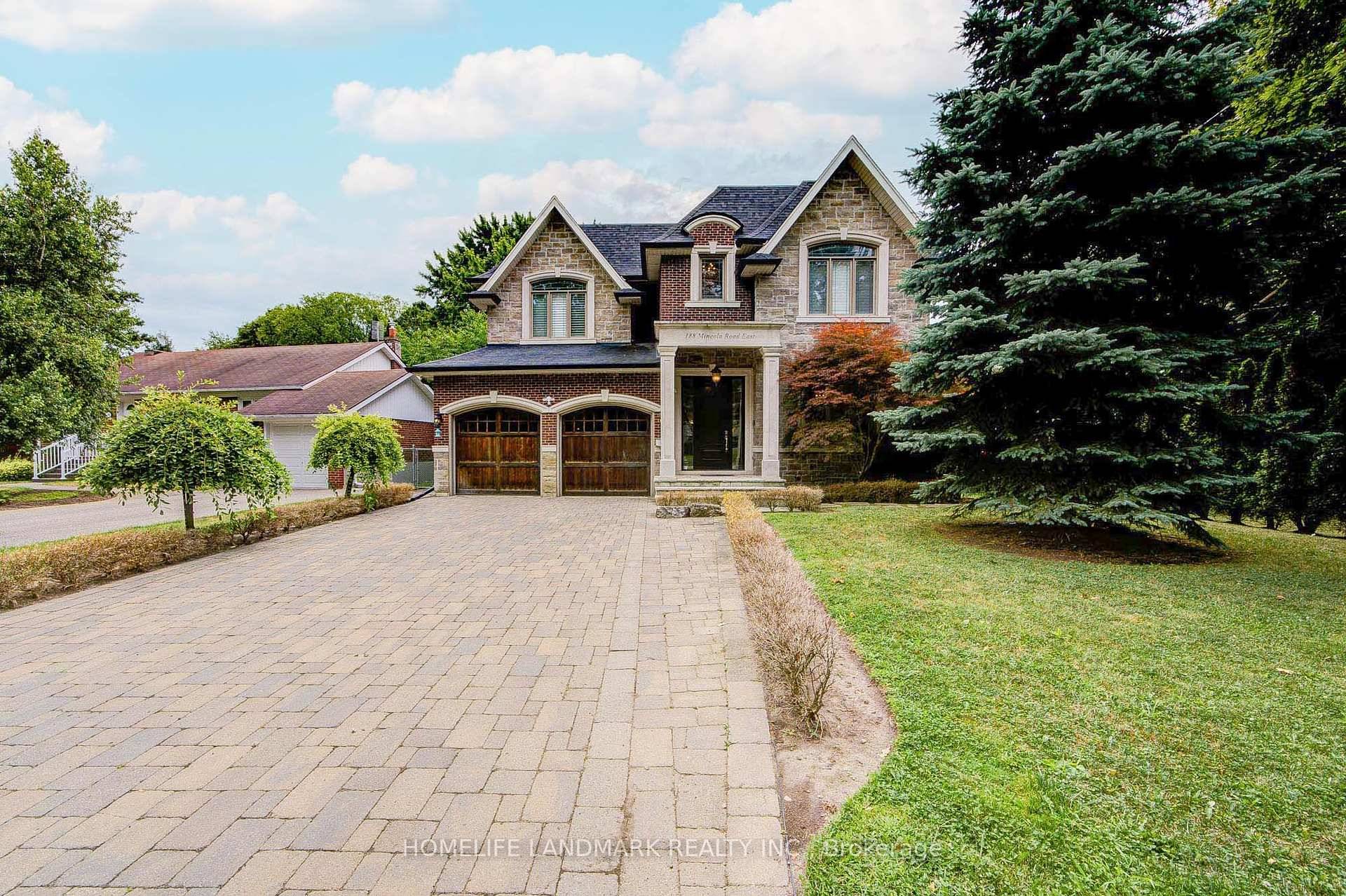 Stunning custom built residence in prestigious Mineola East offering nearly 4, 900 sq.