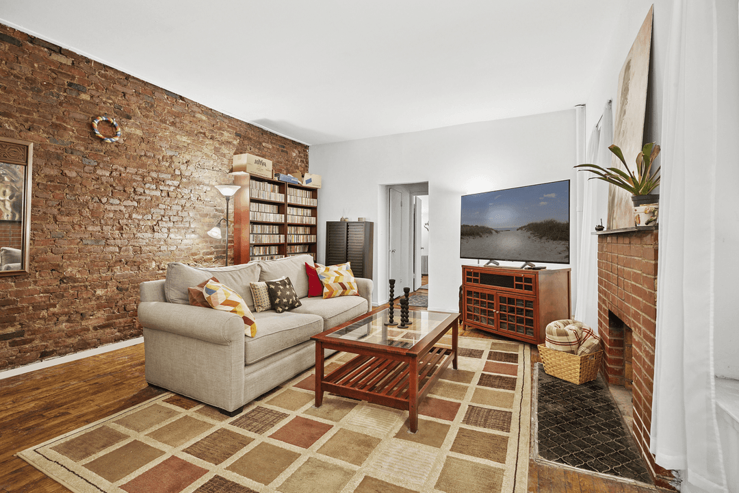 This large East Village 1BR 1BA is full of charm and character, offering features rarely found at this price point, exposed brick walls, an original decorative fireplace, a renovated windowed ...