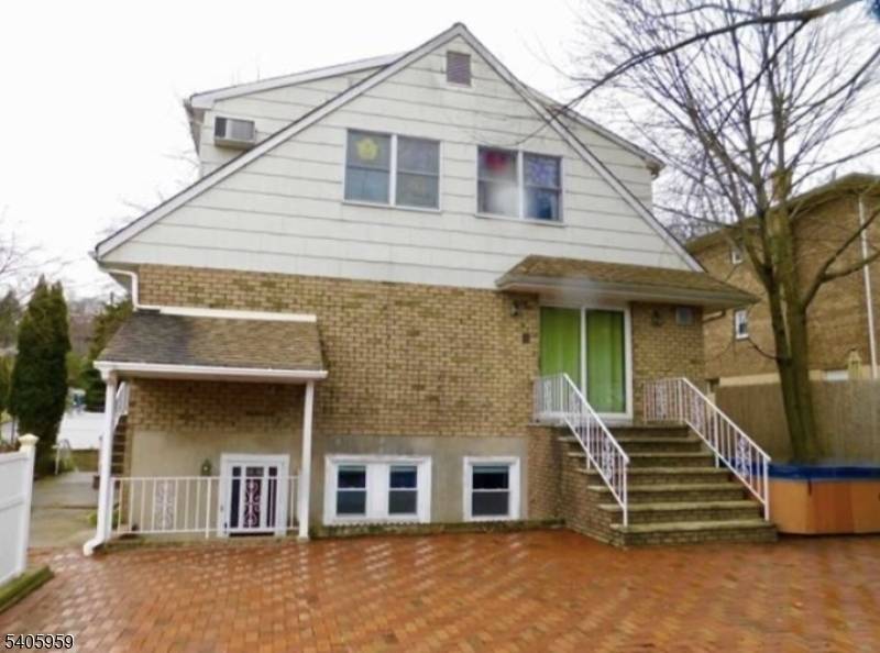 Ideal for investors or luxurious owner occupied living, this elegant two family home is set proudly on a large corner property and offers exceptional space, comfort, and versatility.