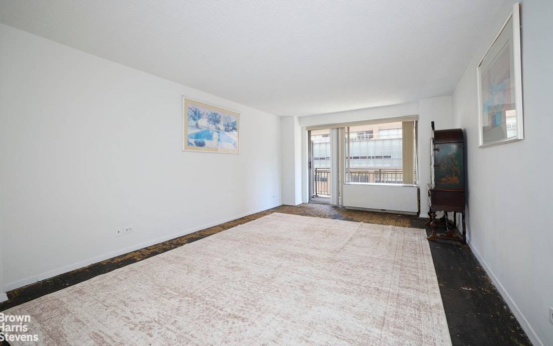 Welcome to Apartment 8G a spacious home with boundless potential in the heart of Murray Hill.
