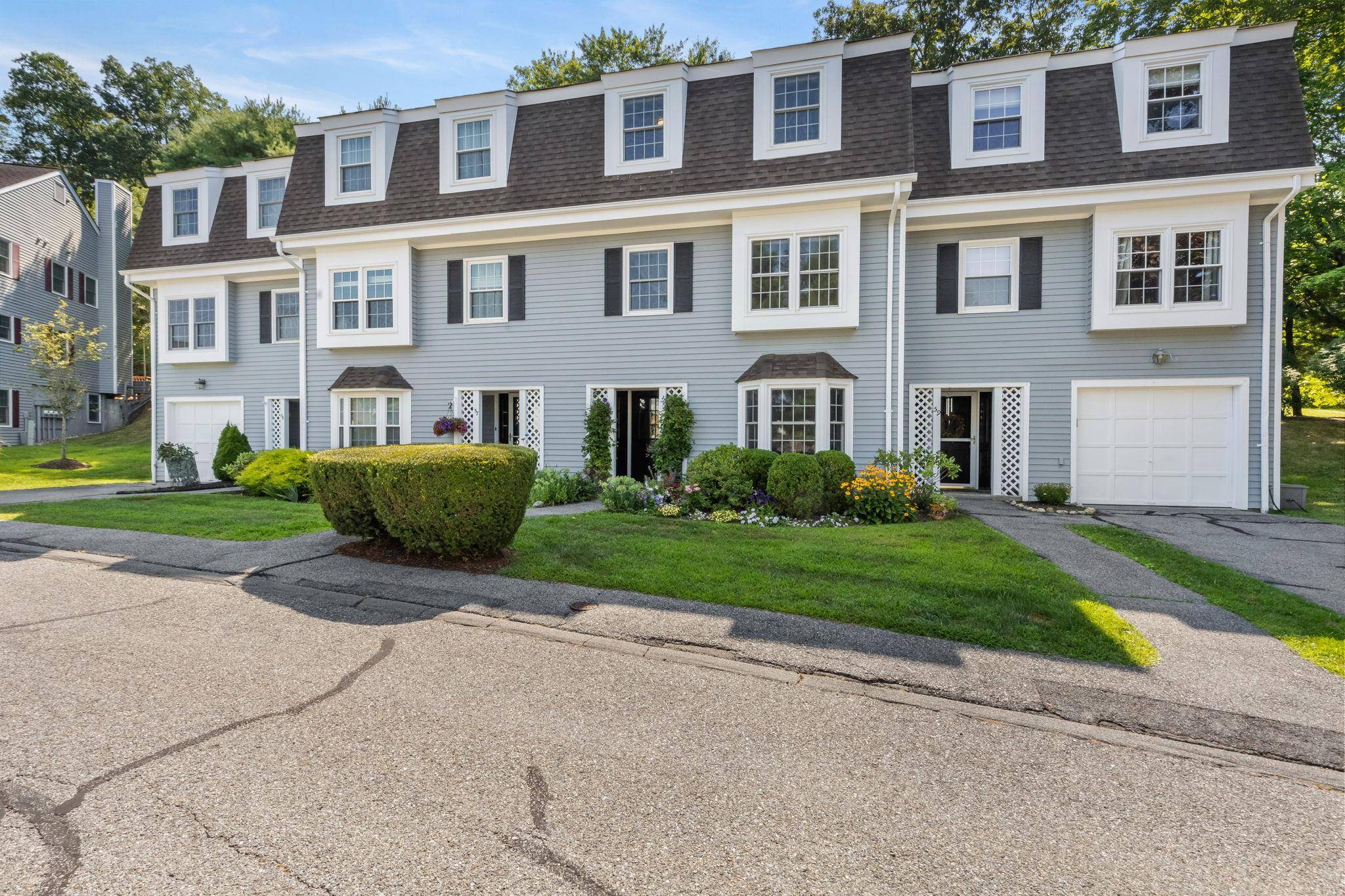Discover the inviting charm of 58 Winterberry Circle, a desirable 1941 sq ft townhouse nestled within The Meadows.