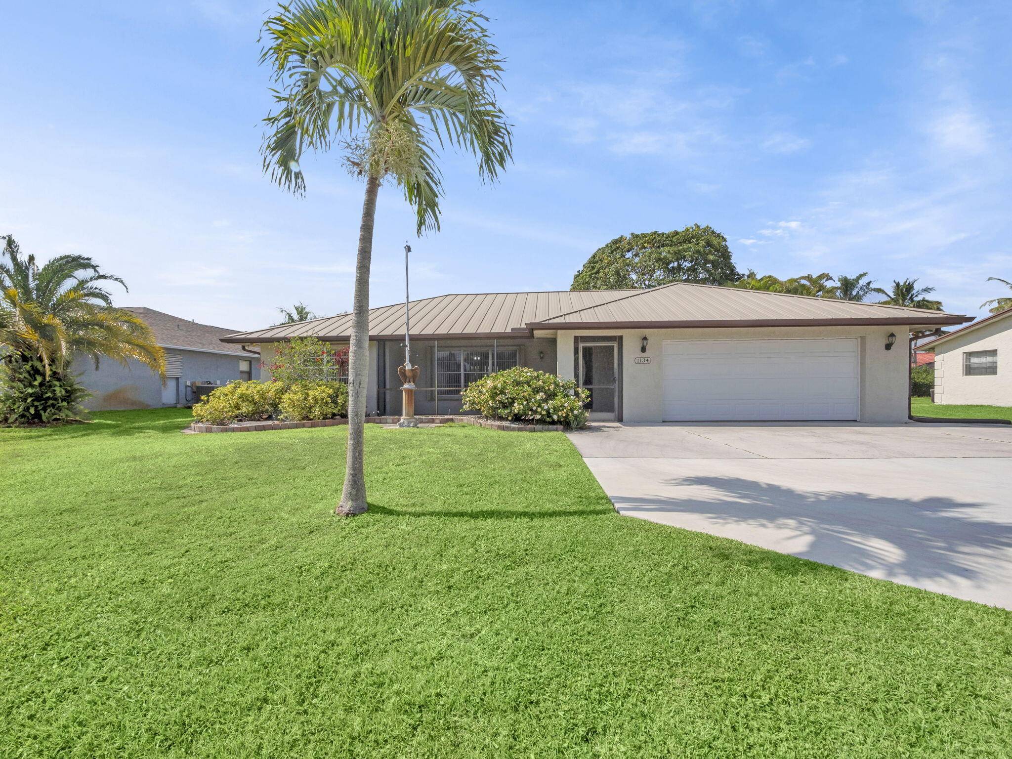 Welcome to this spacious 1, 759 sq ft split floor plan CBS ranch home in the sought after Sandpiper Bay neighborhood !