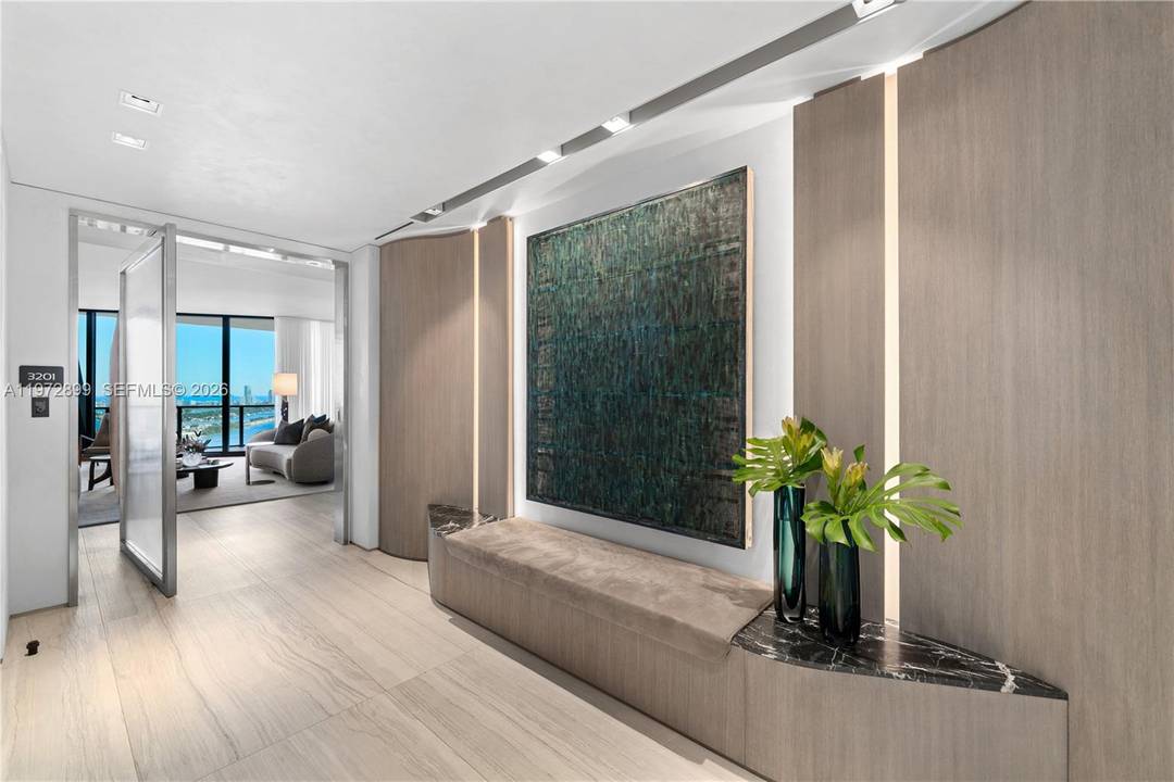 Perched on a high floor at One Thousand Museum, this meticulously appointed 4 bedroom, 5.