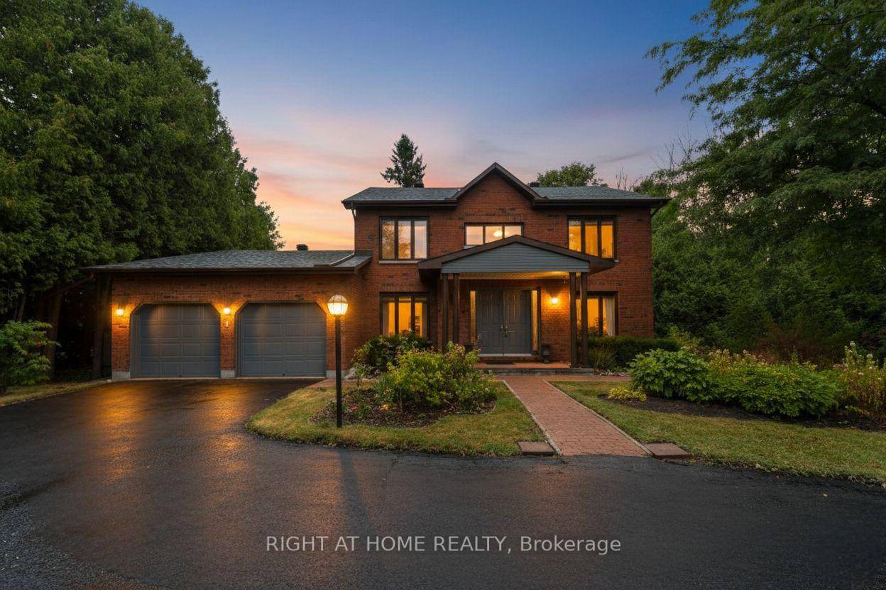 Impeccable custom built home with over 3200 sq ft of living area situated on over 1 acre of serene privacy in the prestigious Cedarhill Estates.