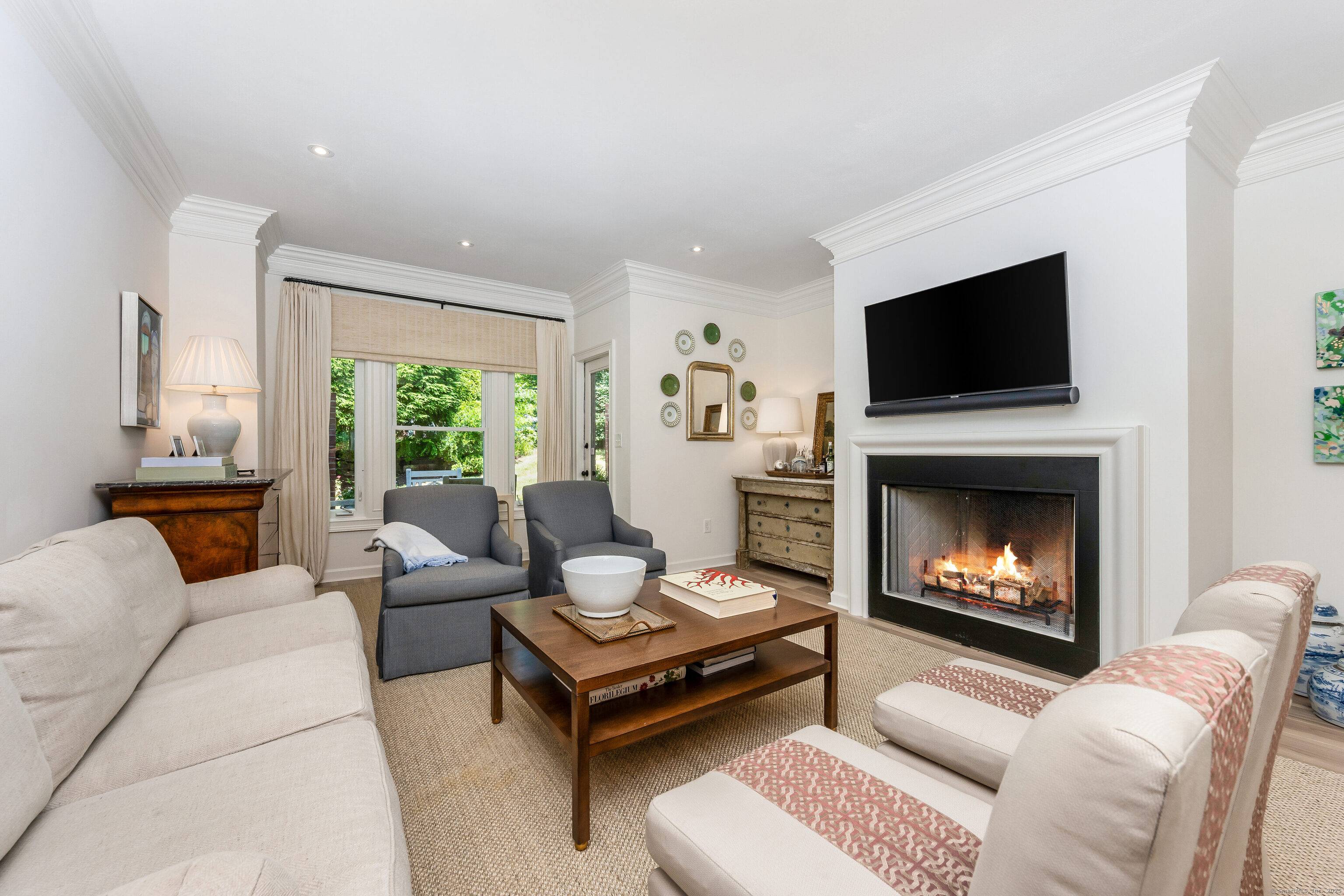 Sophisticated two bedroom, two full bathroom townhouse walkable to town and train.