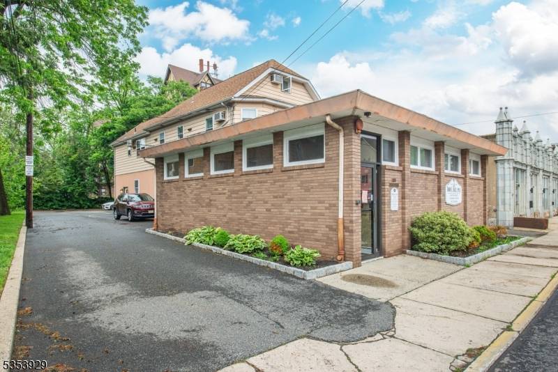 Exceptional opportunity in a prime location in town to own this mixed use property consisting of a commercial space on first floor previously used set up as a dental practice ...