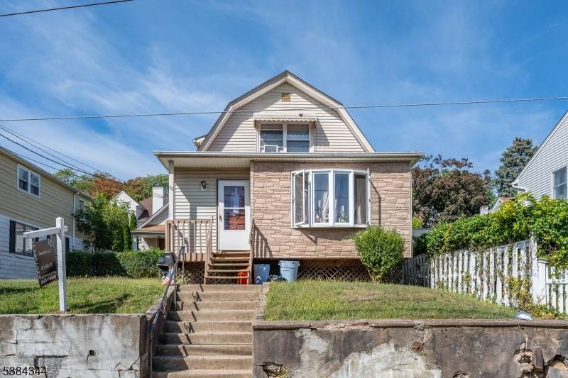 Rare opportunity ! Two single family homes on one lot, perfectly suited for investors or owner occupants.