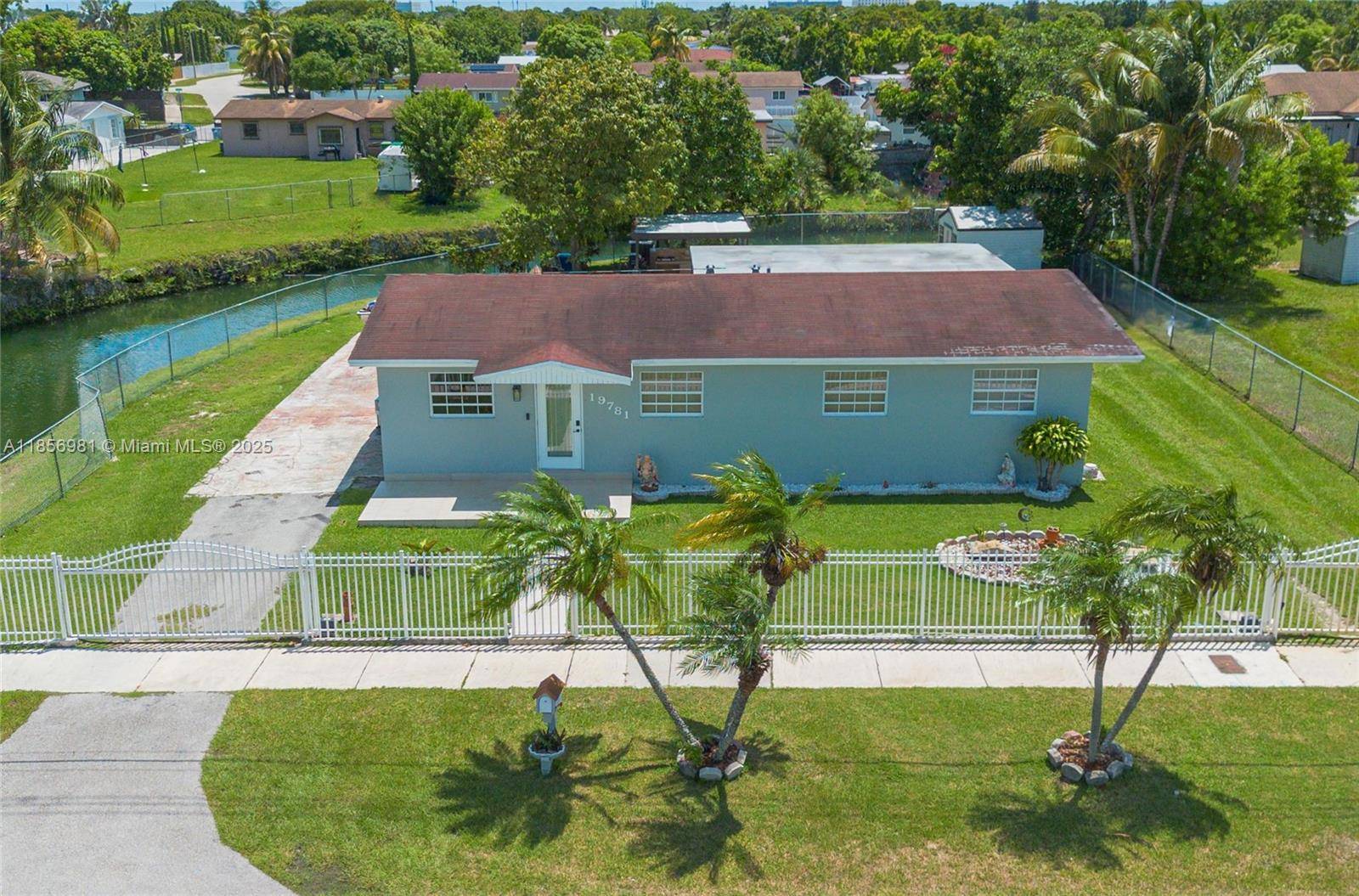 Your Canal Front Oasis with Built In Rental Income Beautifully remodeled 4 bedroom, 3 bath canal front home in 33177 offering style, comfort, and income potential.