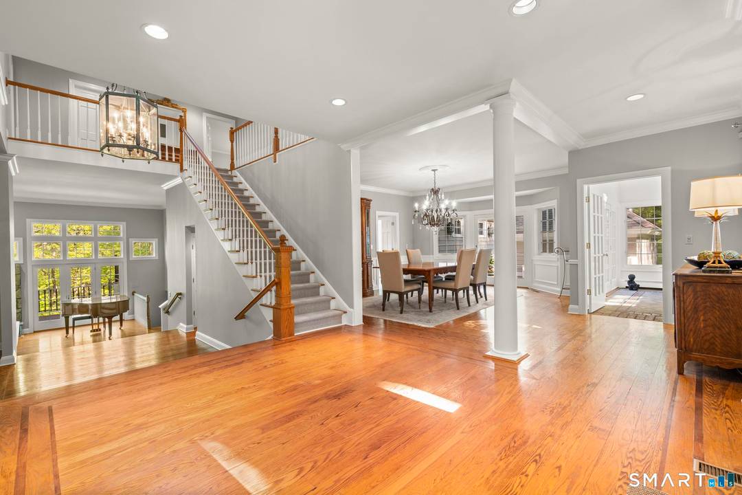 Set on 3. 52 picturesque acres abutting conservation land, this exceptional 4 bedroom estate on iconic Nod Hill Road offers privacy, timeless beauty, and refined living in the heart of ...