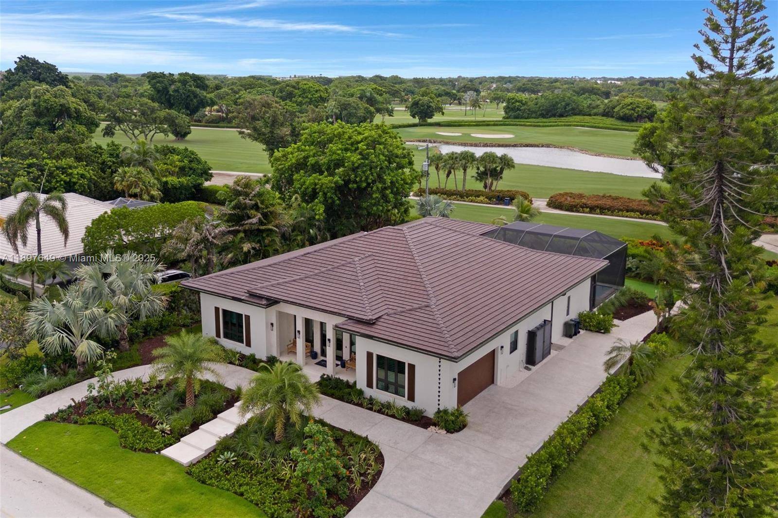 Brand new 4BD 5. 5BA masterpiece on the 15th tee of the Dolphin Course at Ocean Reef Club.