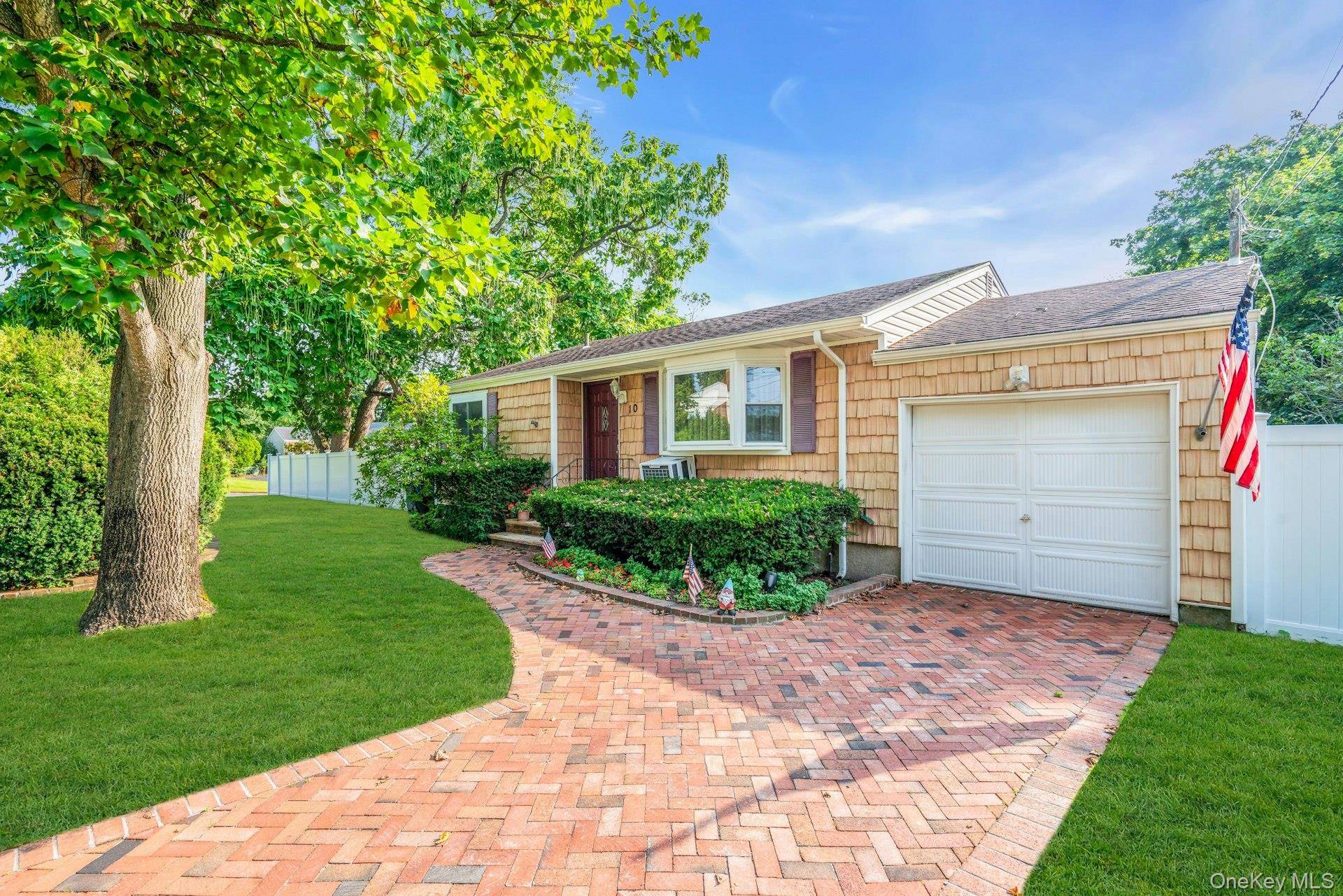 Cozy Ranch with 3 bedrooms and 1 full bath on more than a quarter acre corner lot.
