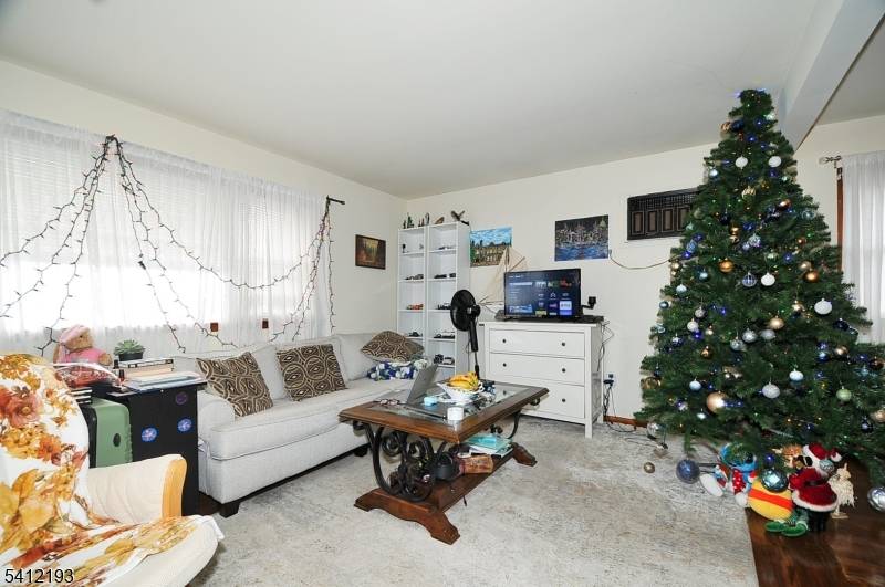 Spacious multi family home located on quiet one way street with 2 large apartments.