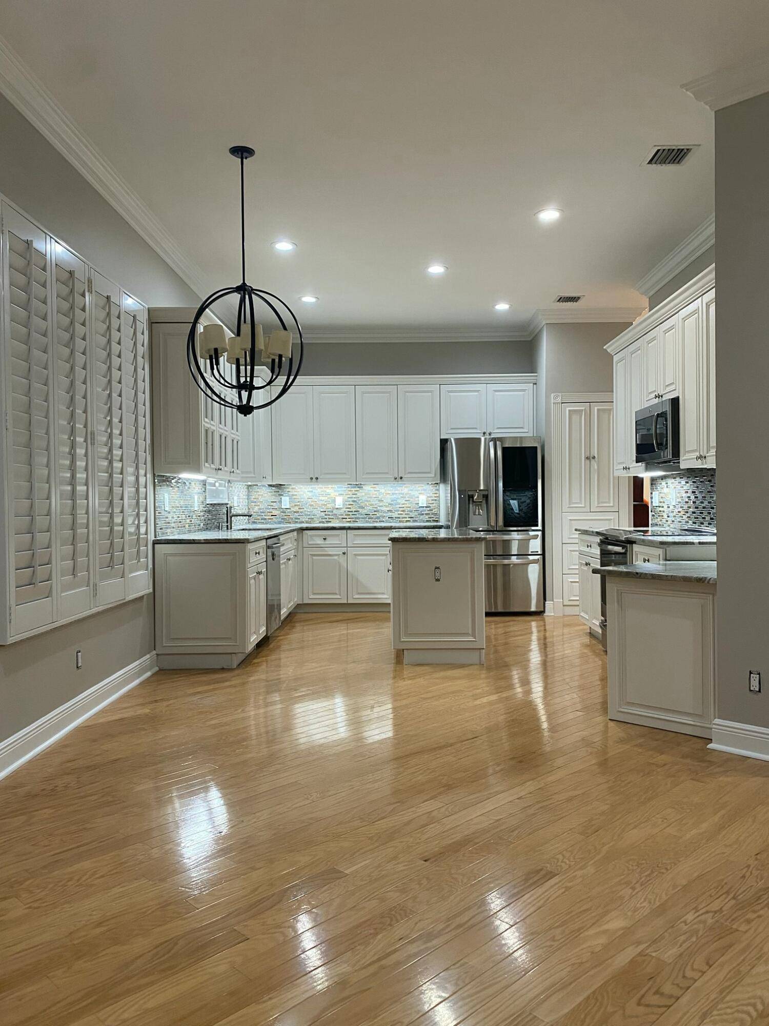 Step into your dream retirement at this beautifully remodeled ranch style home nestled within a coveted 55 community.