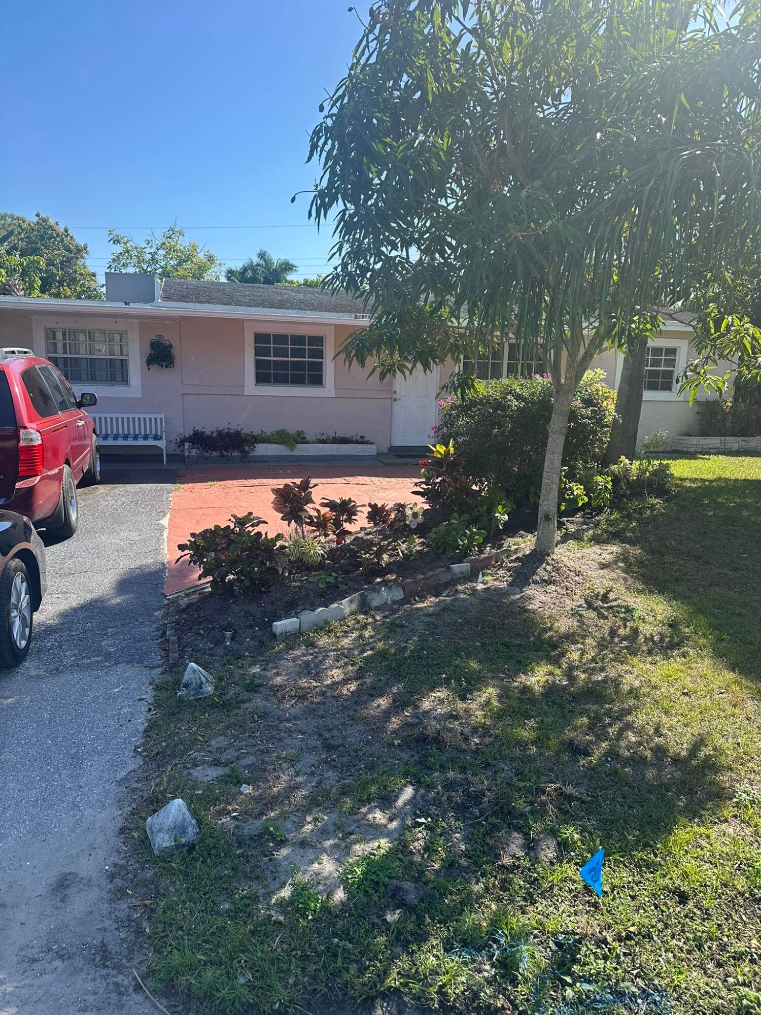 Step into the perfect blend of style and comfort with this stunning 4 bedroom, 2 bathroom home in the heart of West Palm Beach.