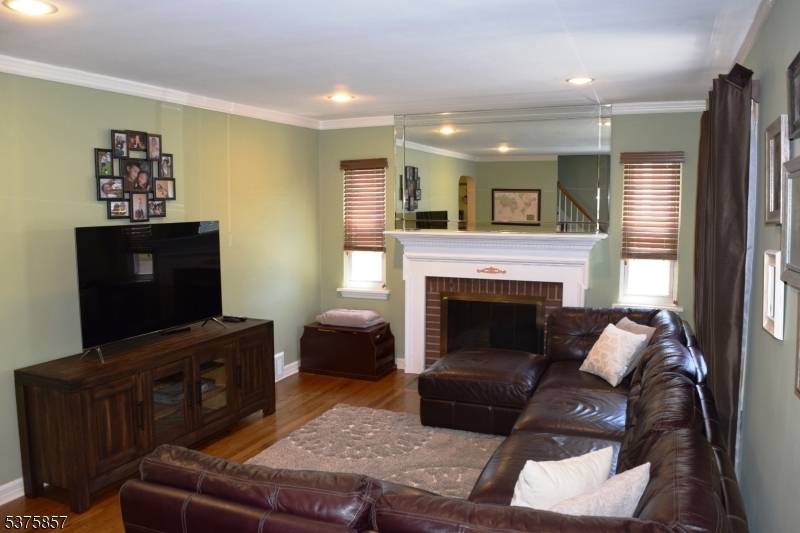 Fully updated and immaculately maintained brick Cape Cod with over 1400SF of living space per tax records.