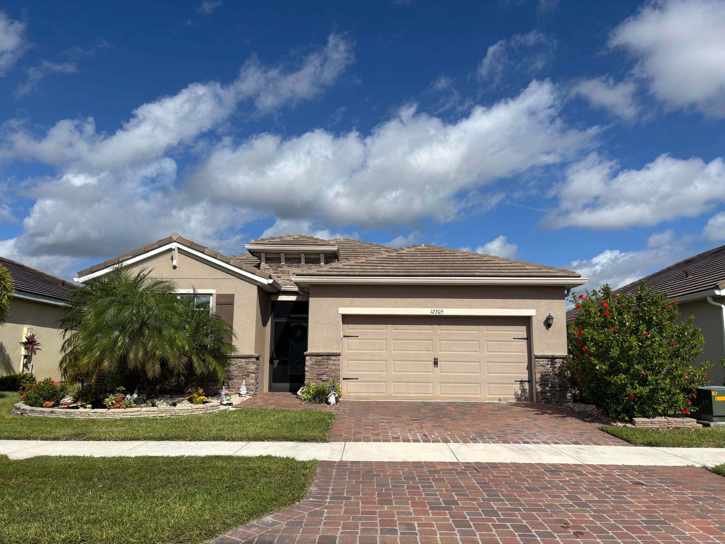 Beautifully upgraded home featuring a heated inground pool overlooking an expansive lake with gorgeous views of the sunsets, space launches, and wildlife.