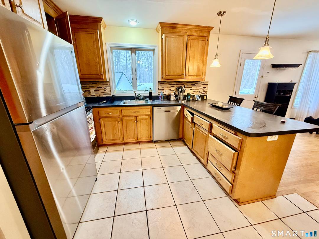 This property is located on a cul de sac street with limited traffic, offering a peaceful setting ideal for those seeking privacy without sacrificing convenience.