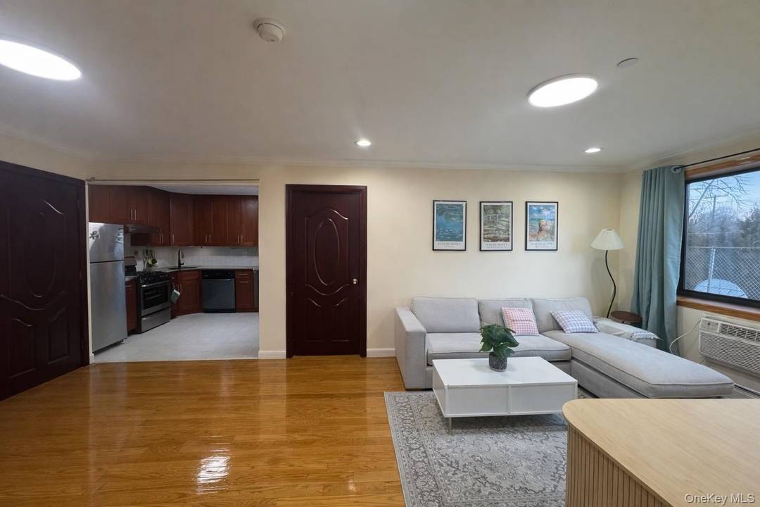 Welcome to this modern and well maintained condominium in the heart of Fresh Meadows.