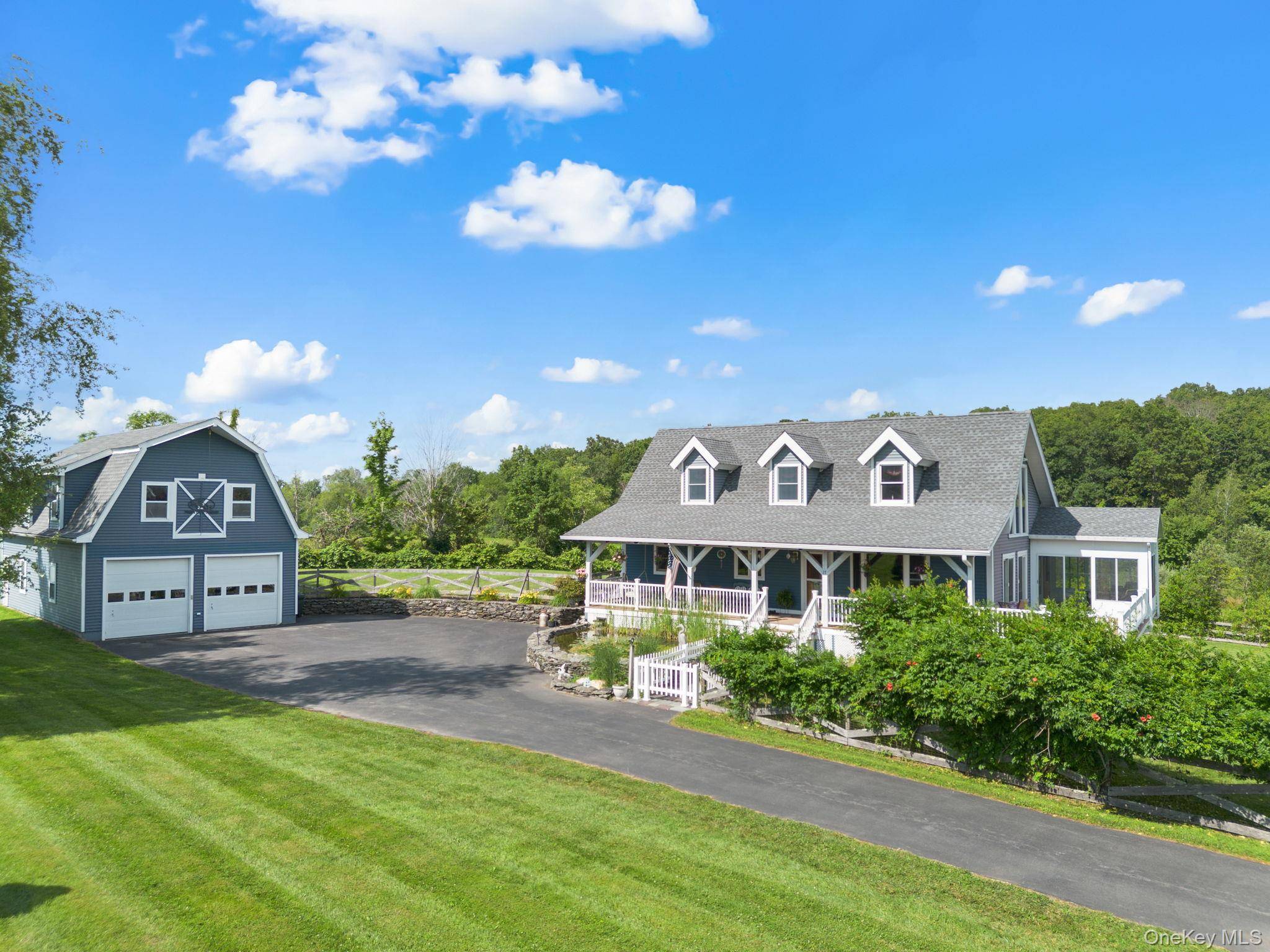 Beautiful, custom Post and Beam home with covered front porch is a must see, as is the gorgeous property !