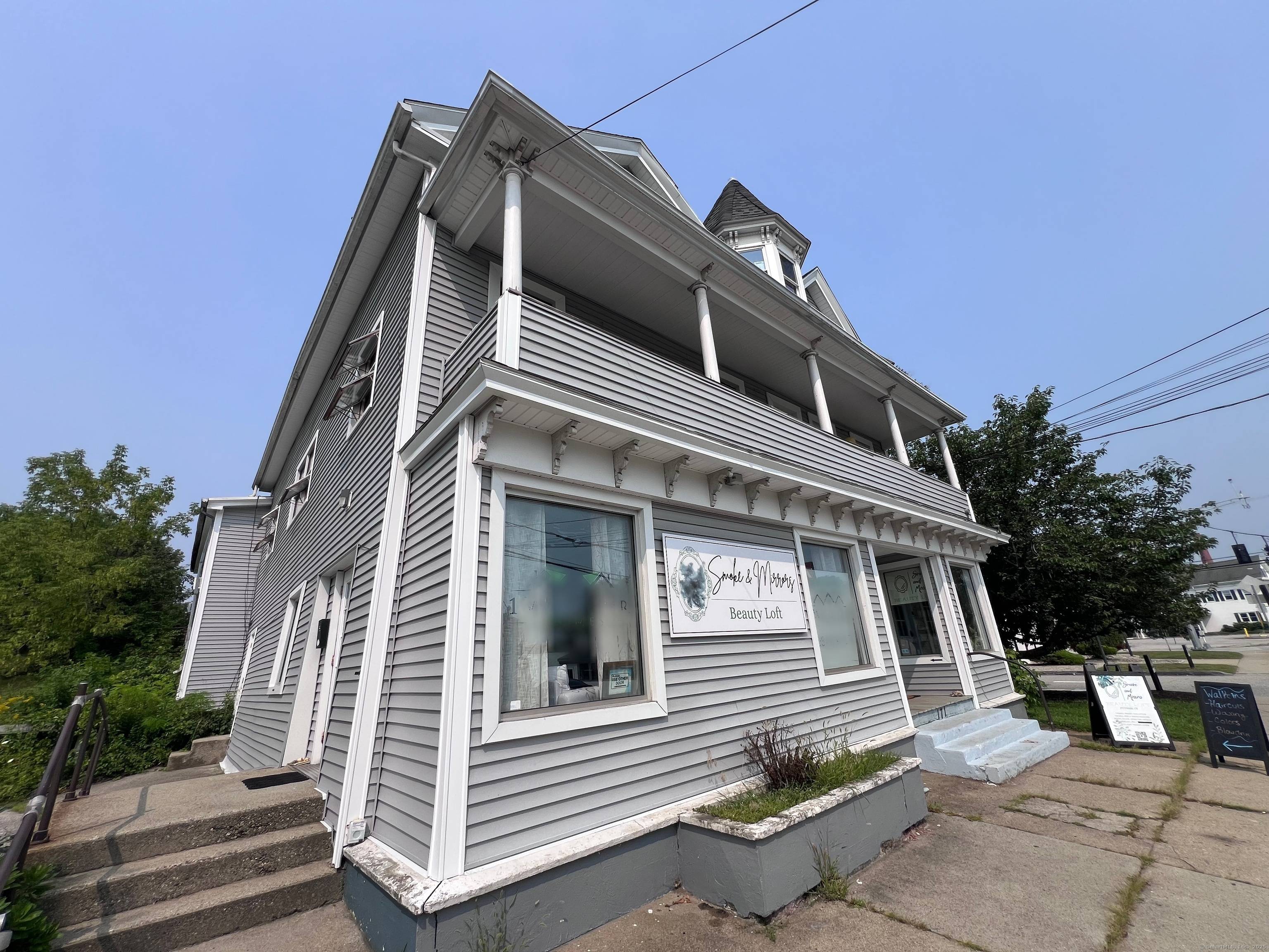Don't miss this rare chance to own a versatile 5 unit mixed use building in the heart of a rapidly growing town.