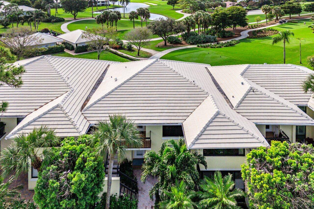 Inviting 3 bedroom, 2 bath residence boasts breathtaking double fairway golf lake views, offering a serene and picturesque backdrop.