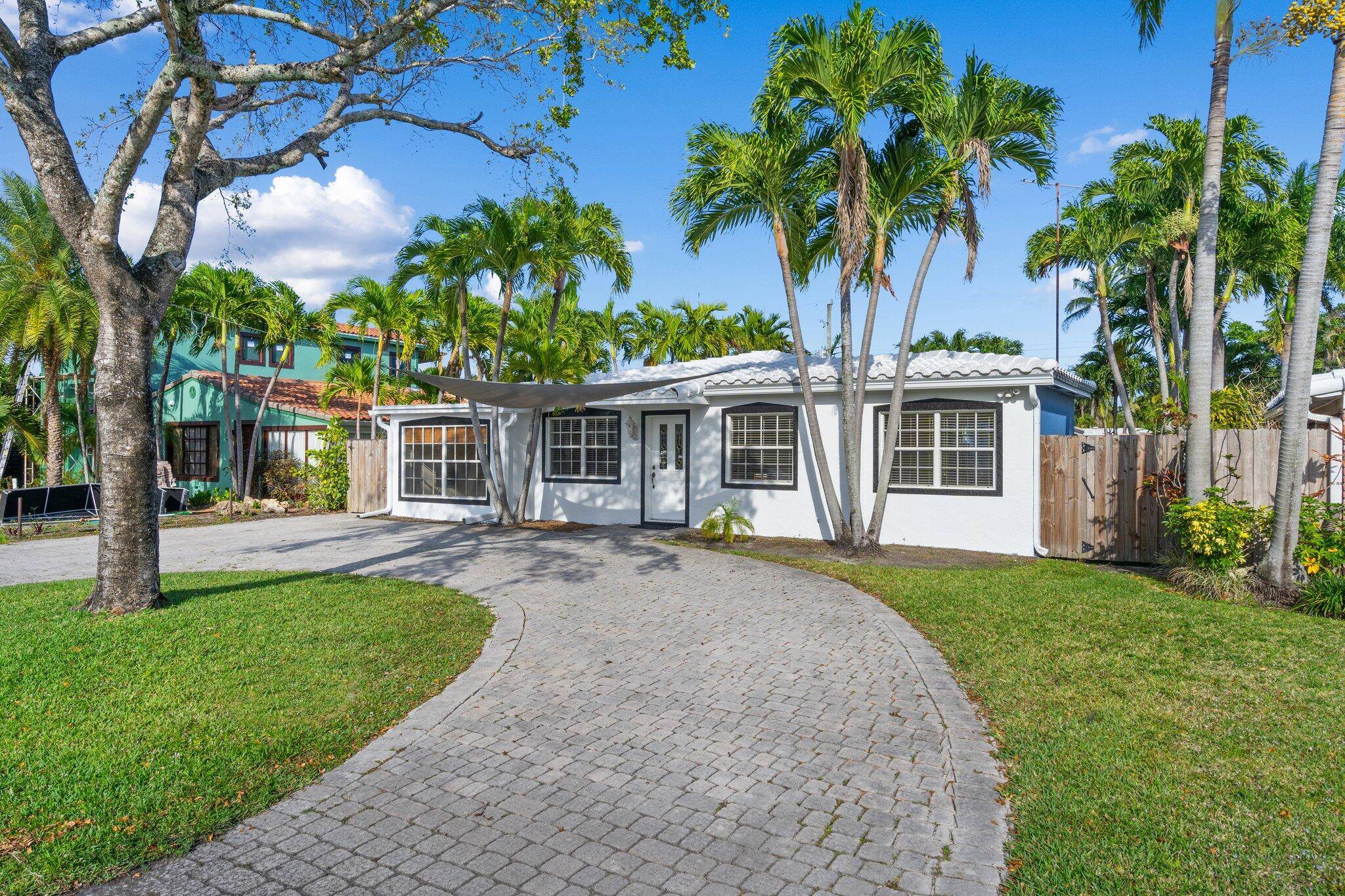 4 5 bedroom, 2 bathroom Pool home in the sought after community of Poinsettia Heights in Fort Lauderdale.