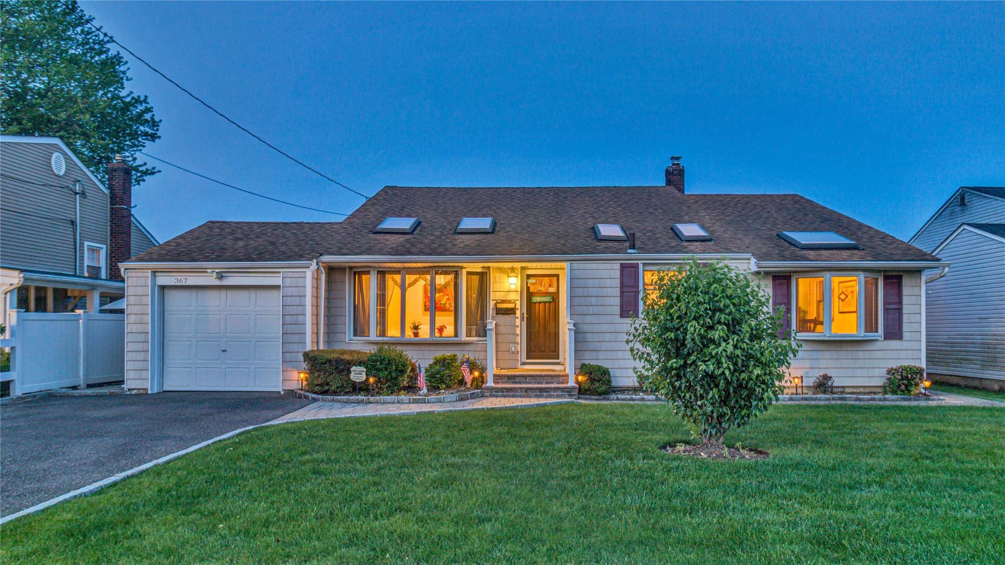 Unpack Your Bags And Move Right In To This Charming Split Level Home In The Heart Of Massapequa Park.