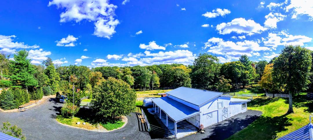 10. 22 acres charming equine farm located right on Newtown bridle lane trail system.