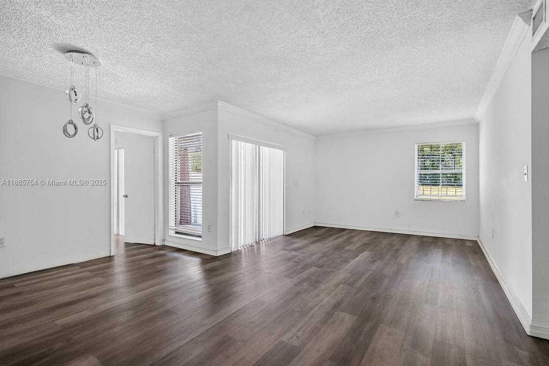 Lovely ground floor corner unit featuring 3 bedrooms and 2 bathrooms.