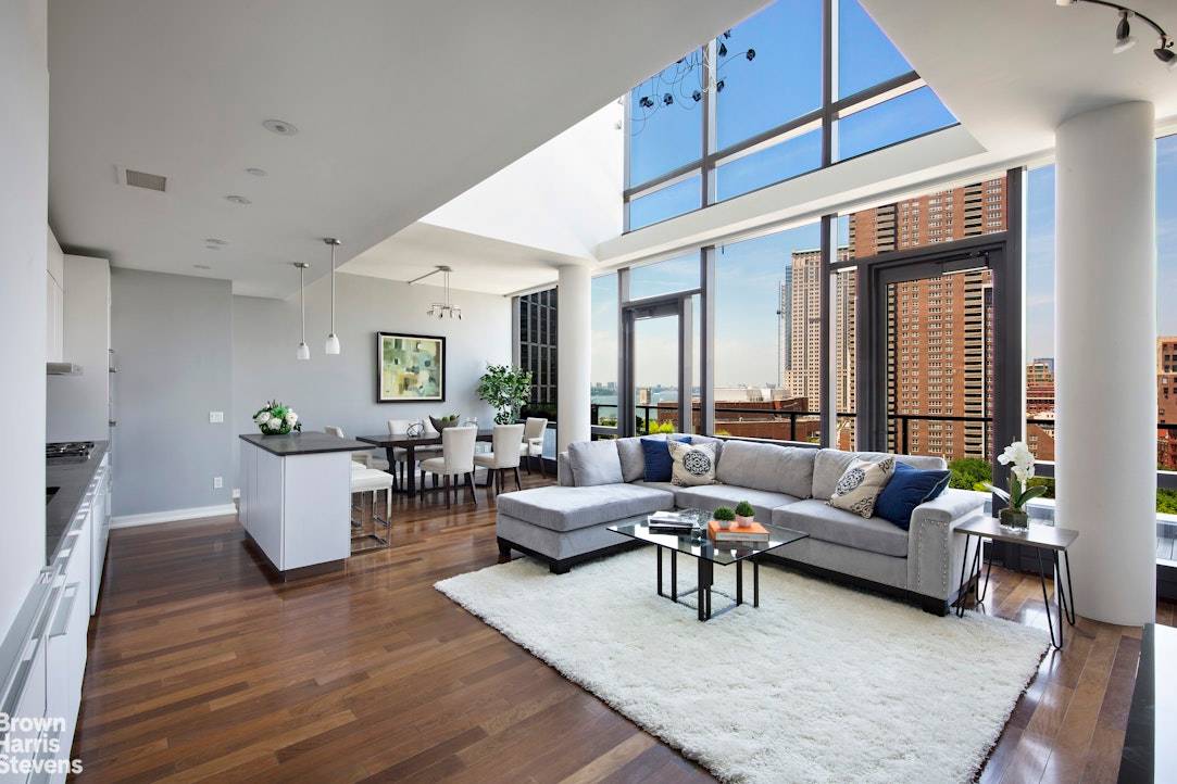ON TOP OF IT ALL Come enjoy an amazing top floor 3 bedroom, 3 bathroom duplex that has 22 ceilings in the great room and 11 ceilings in the bedrooms.