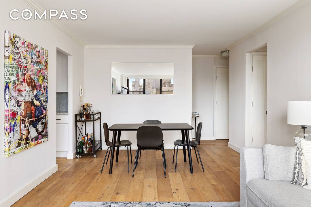 Gut renovated high floor corner two bedroom with spectacular open city views to Midtown at the full service Corniche on the Upper East Side.