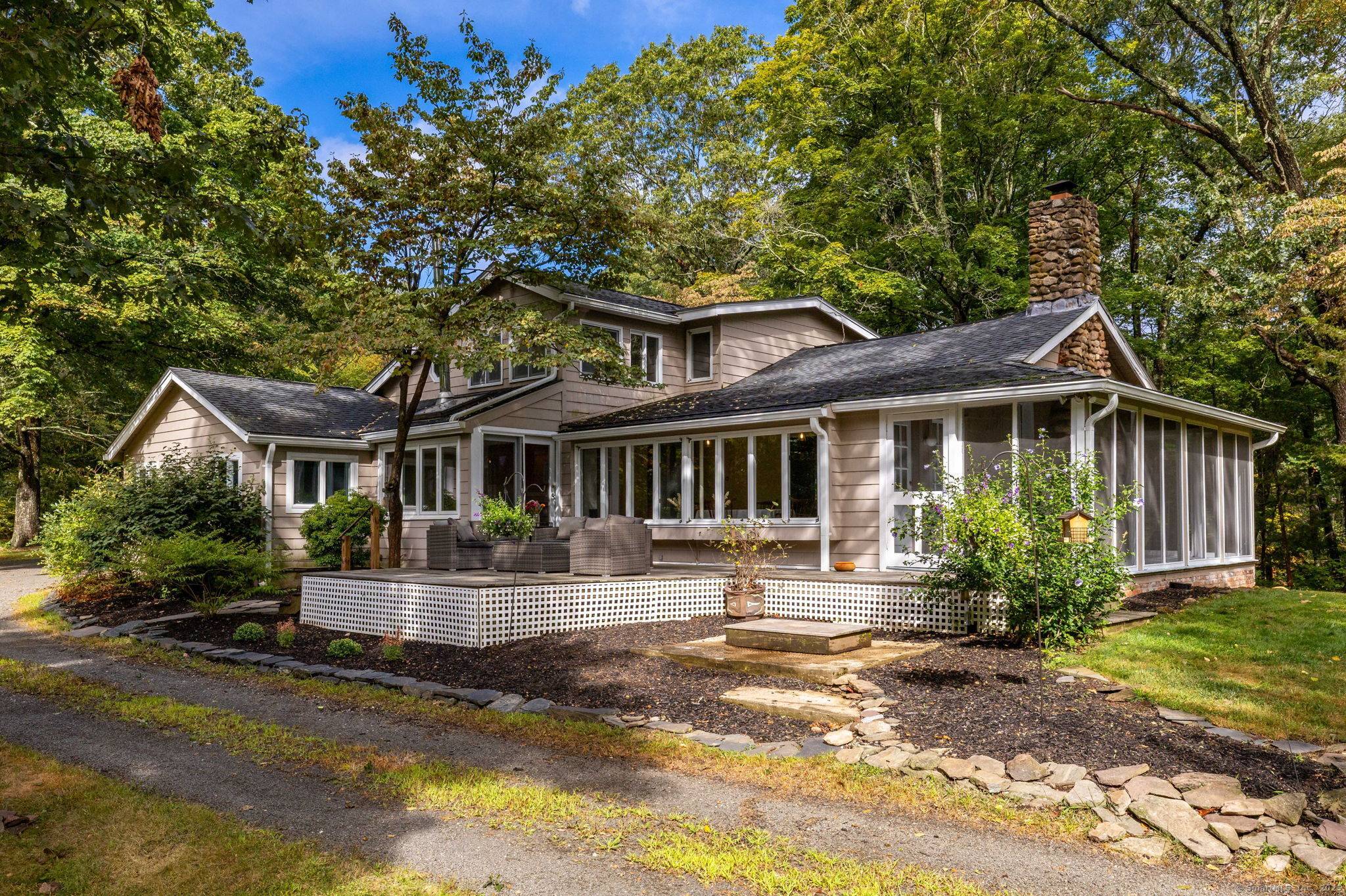 Welcome to 154 Wilbur Ln, a truly distinctive property that sets itself apart from the rest providing over four and half acres of privacy.