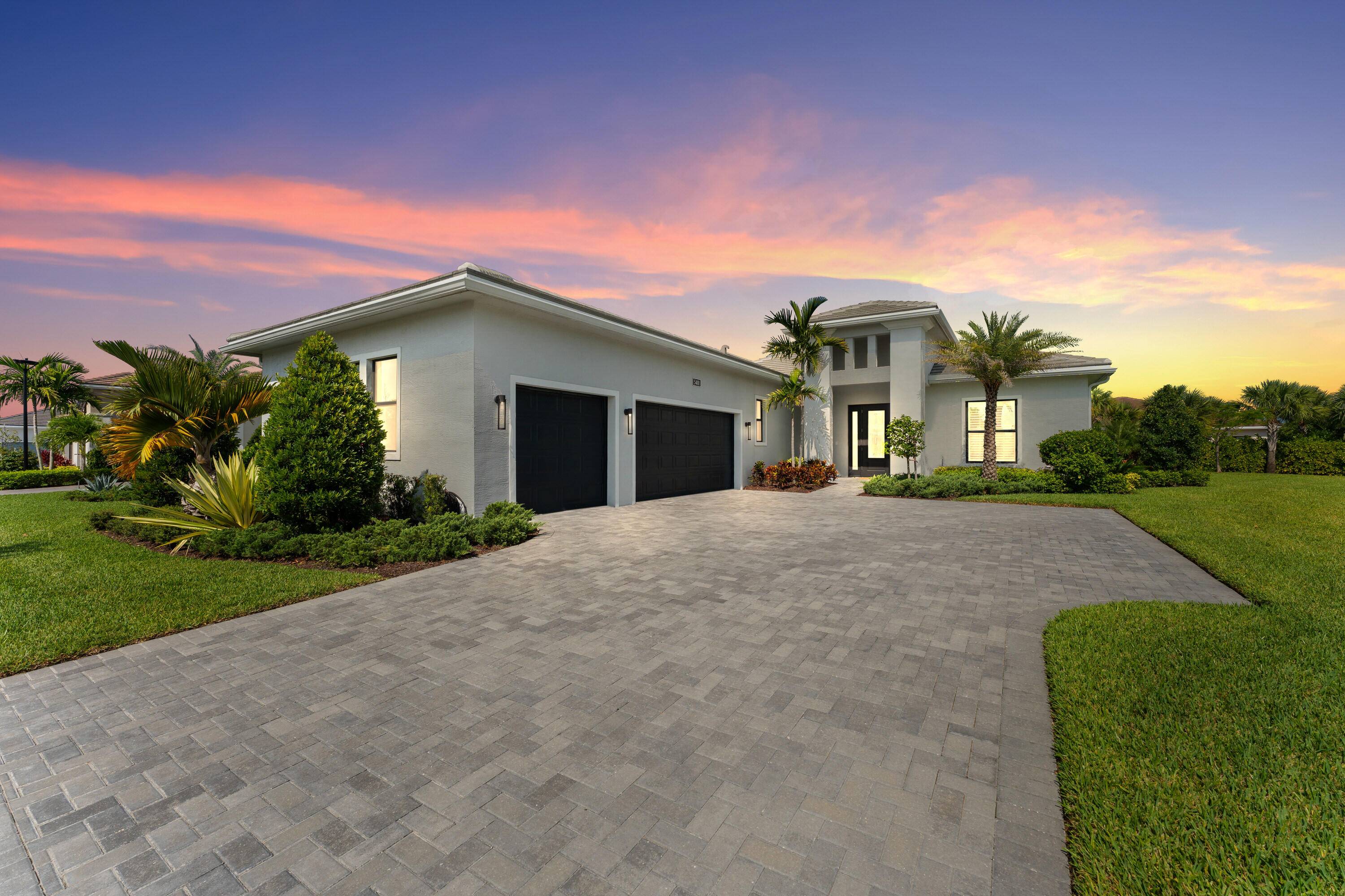 Luxurious Rosemary Model on Private Corner Lot with Saltwater Pool 3 Car Garage in Stunning Cresswind at Westlake !
