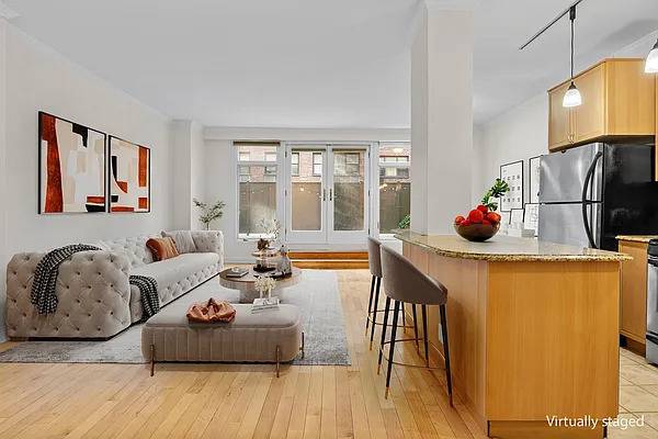 Private Garden Living with Two Bedroom Flexibility I am excited to introduce you to 345 East 73rd Street 1A, a rare Upper East Side residence that offers not only an ...