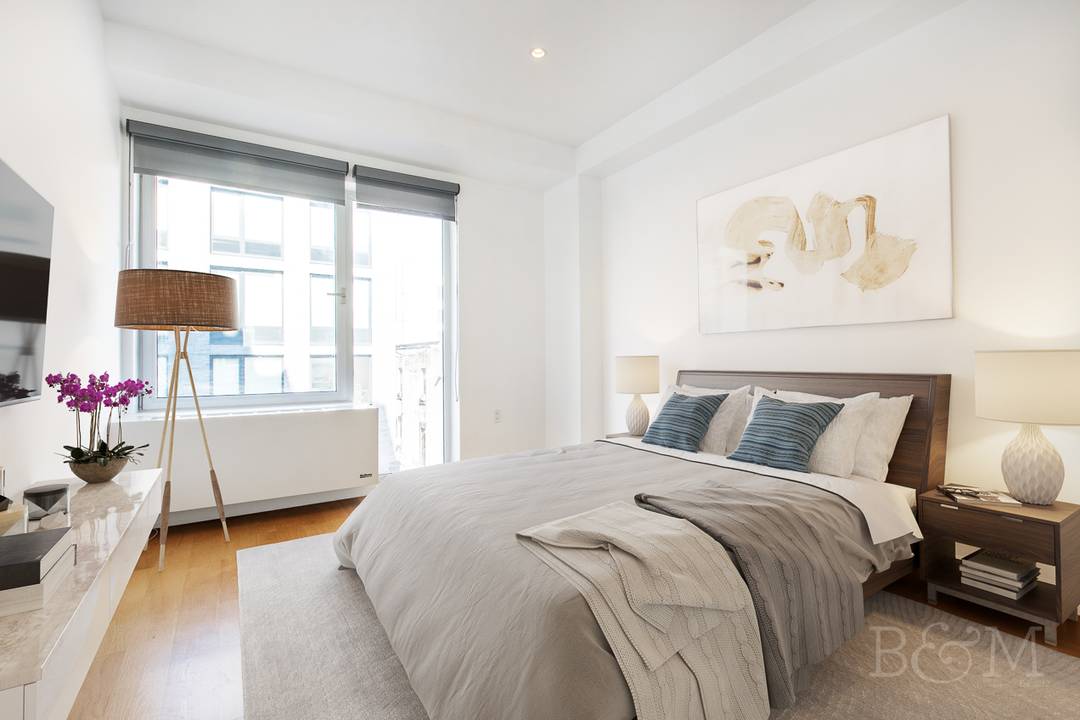 Located on the 4th floor of 260 North 9th Street, this bright, modern one bedroom home offers contemporary design and thoughtful details in a boutique Williamsburg condominium.