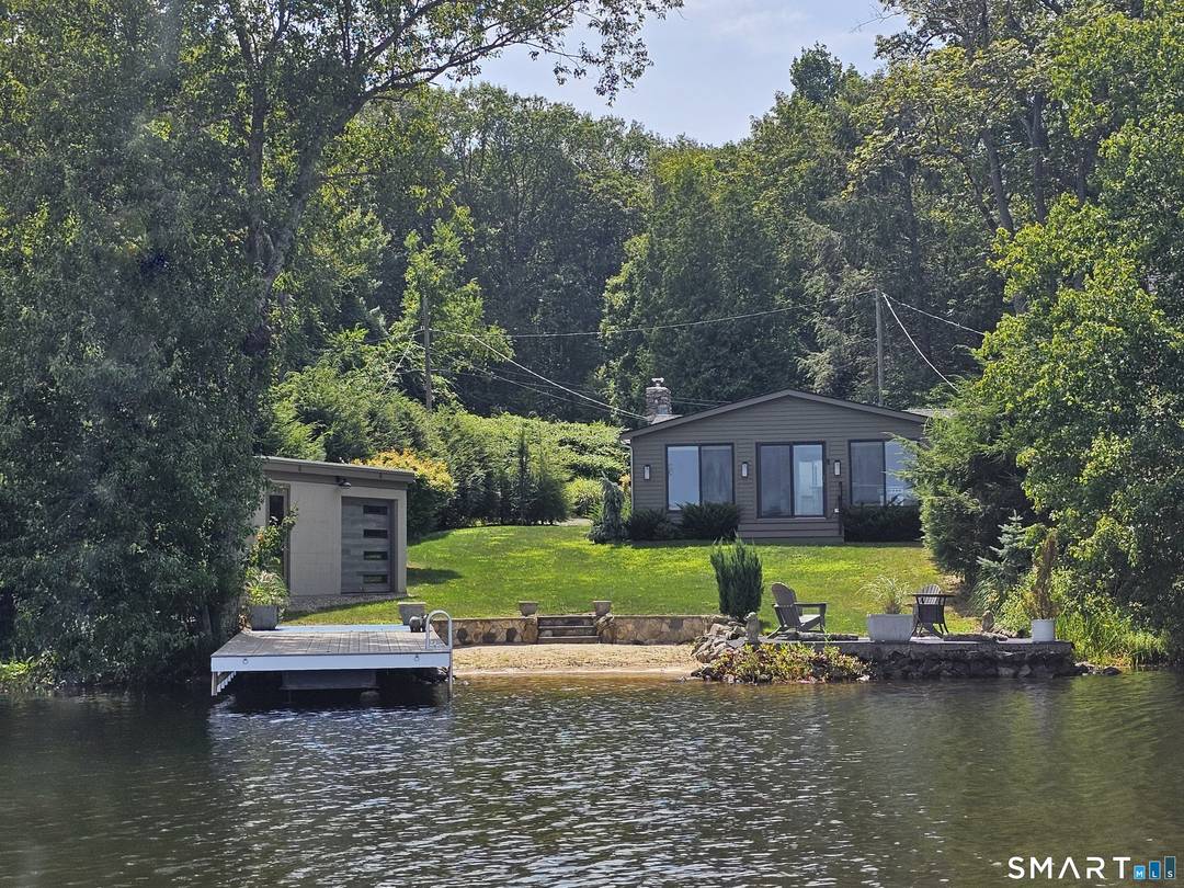 Year round lake living ! Swim, canoe, kayak, fish, hike and unwind on your own beach, located on speed restricted Lake Quassapaug in Middlebury, CT.