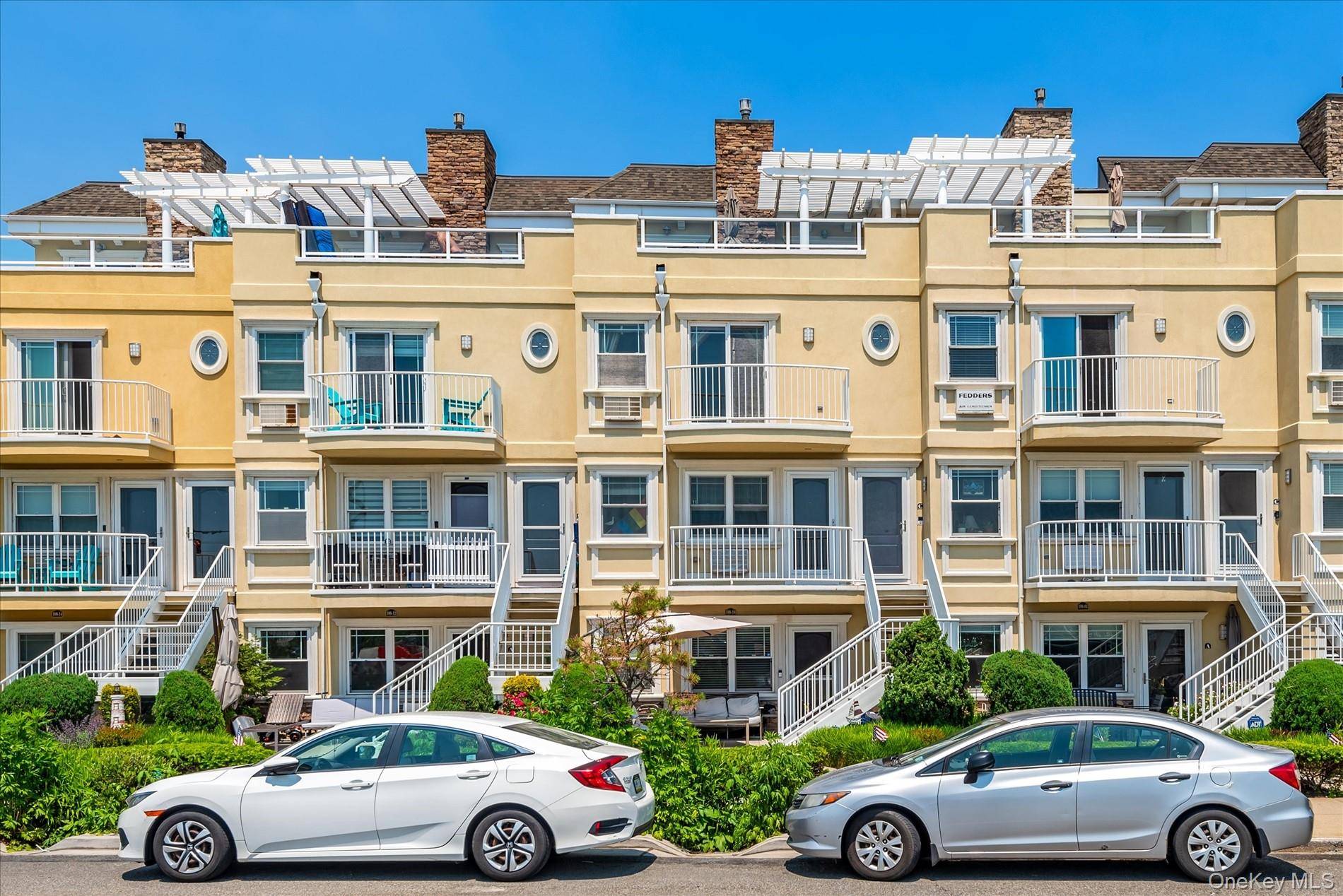 Presenting to you a One of A Kind, Pristine, 2 Bedroom 2 1 2 Bath Designer Oceanfront Duplex Condo For Sale.