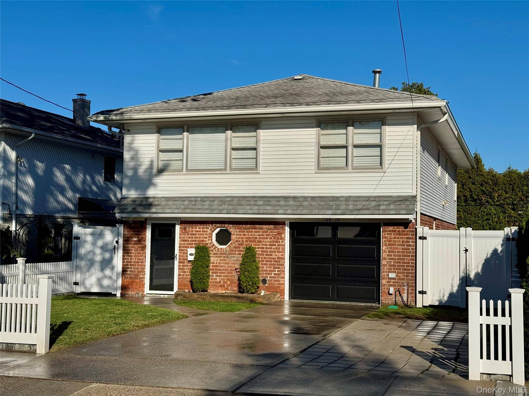 Welcome to this Newly Renovated Modern Traditional Style High Ranch Home.
